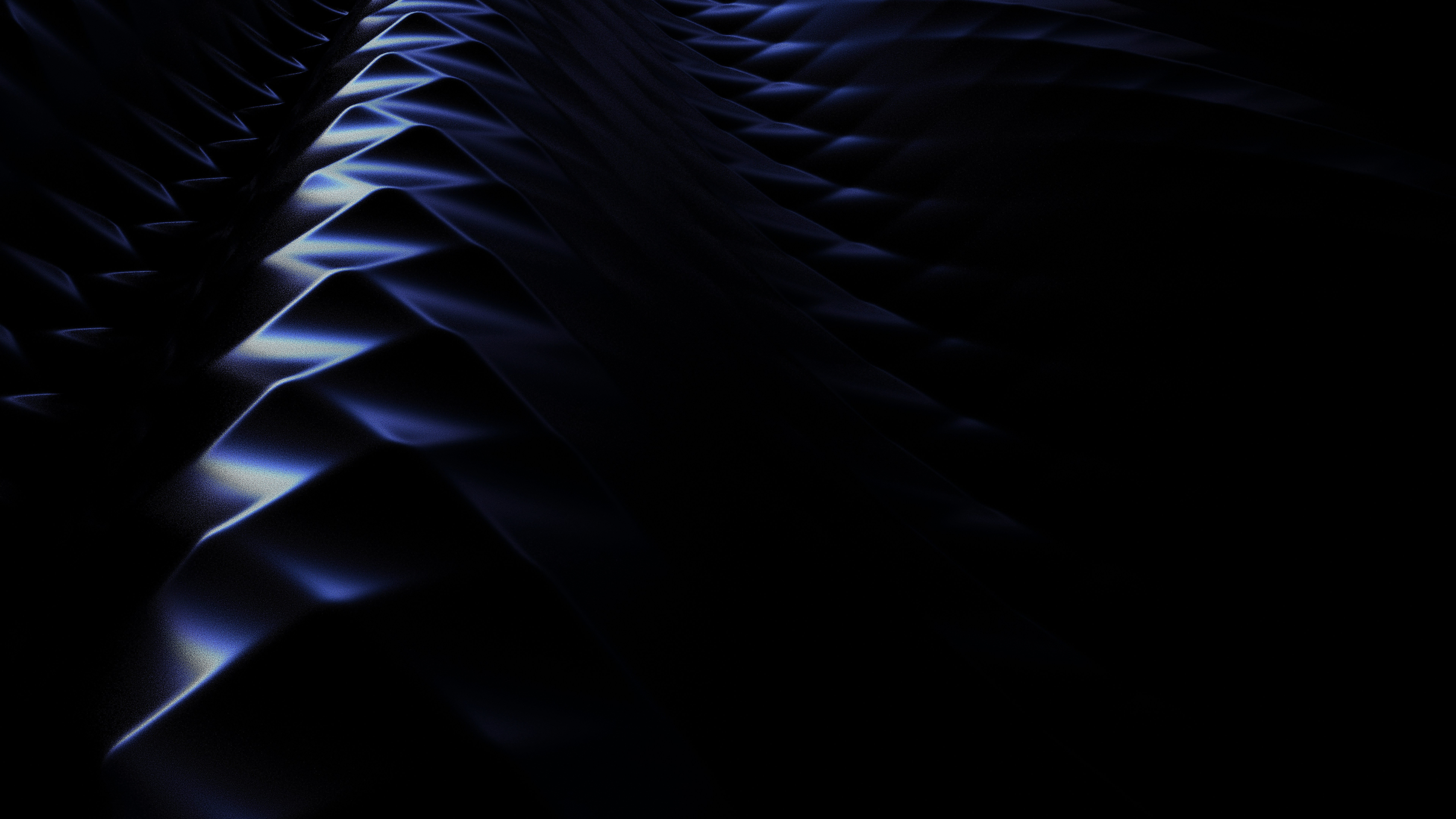 Dark blue abstract waves with sharp ridges and soft highlights