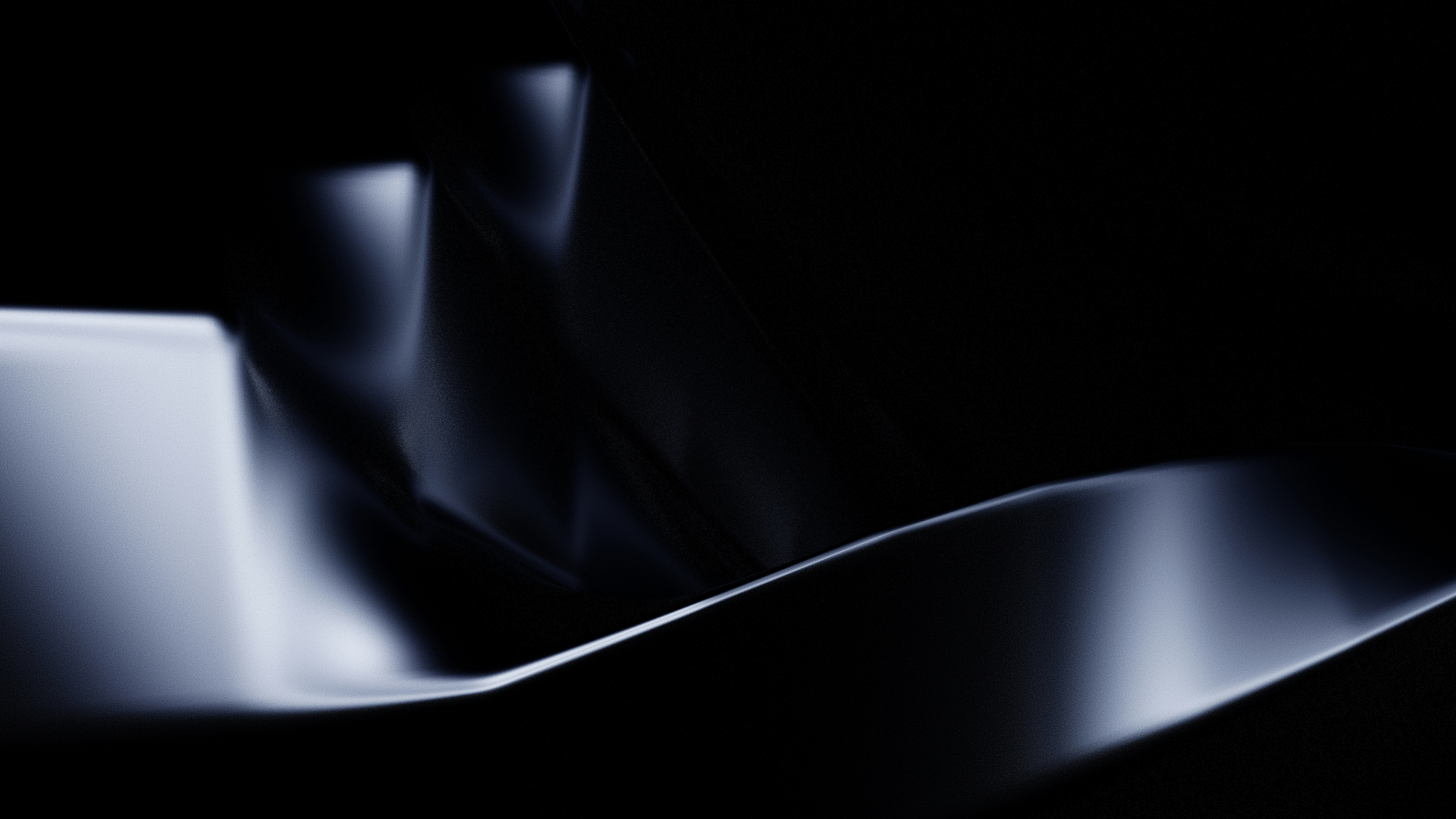 Abstract flowing curves with soft highlights against a dark background
