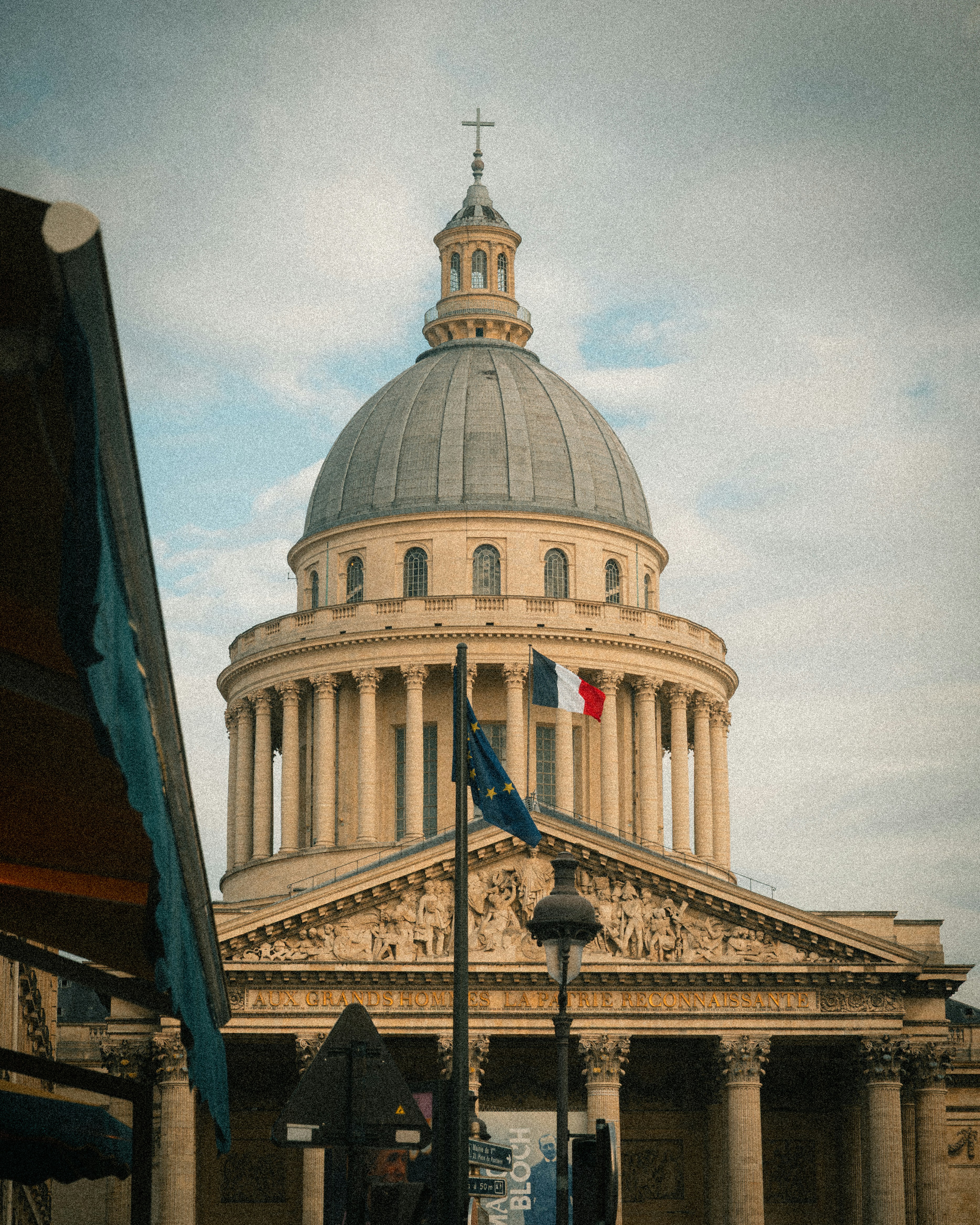The Pantheon dome with French and European Union flags in Paris