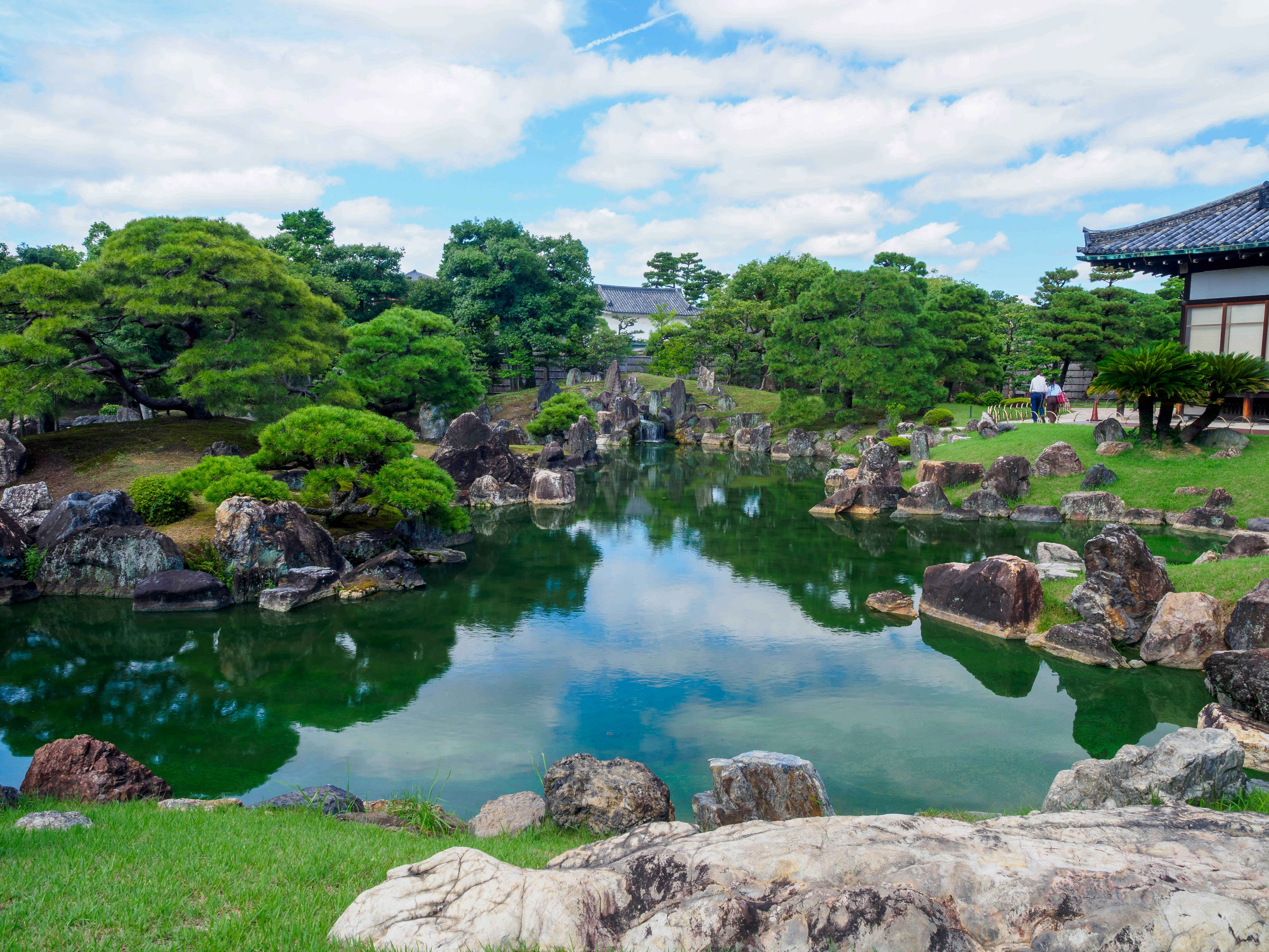 Japanese garden with pond and rocks - Free Photo on Unsplash