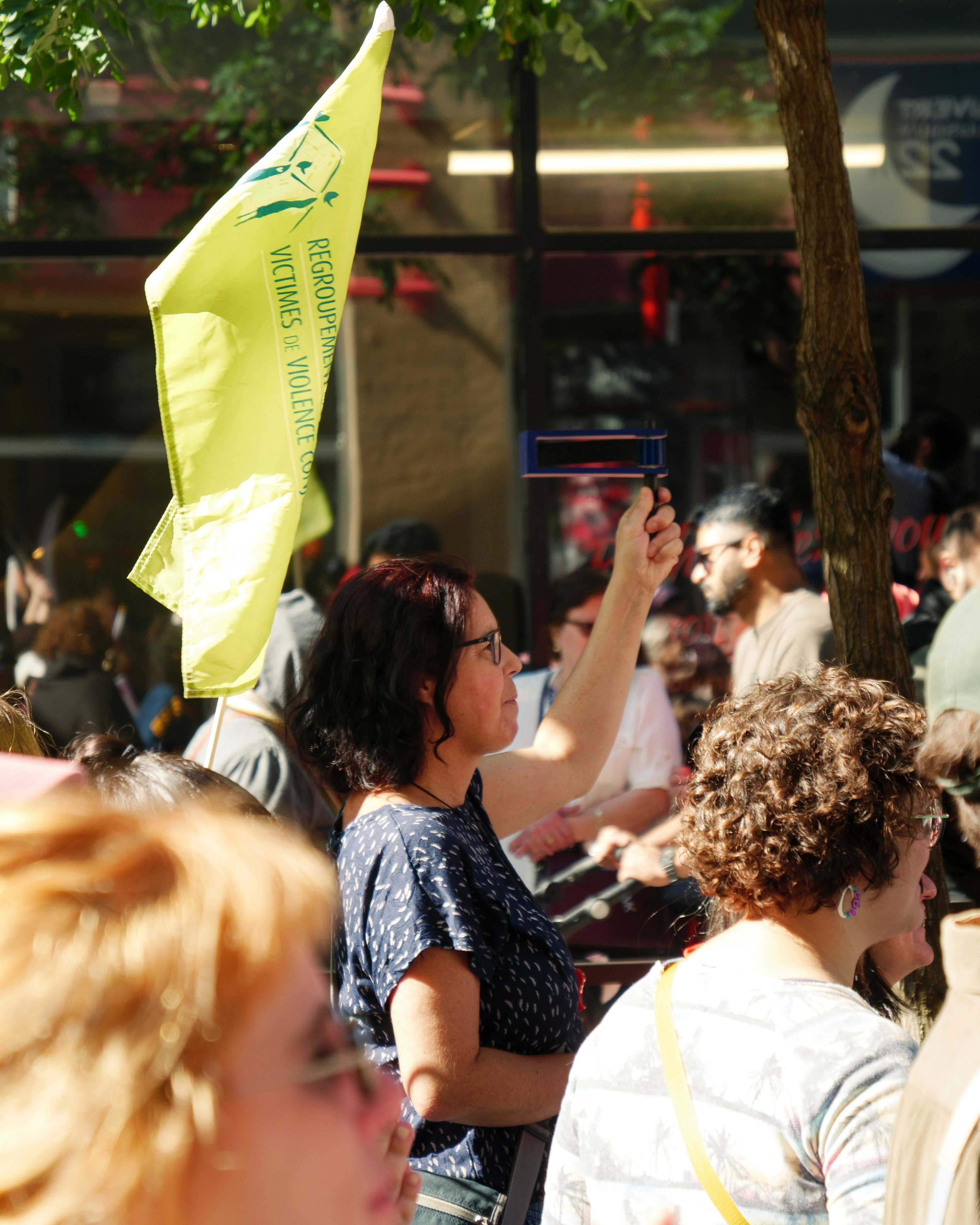 Woman holding flag and noisemaker - Free Photo on Unsplash