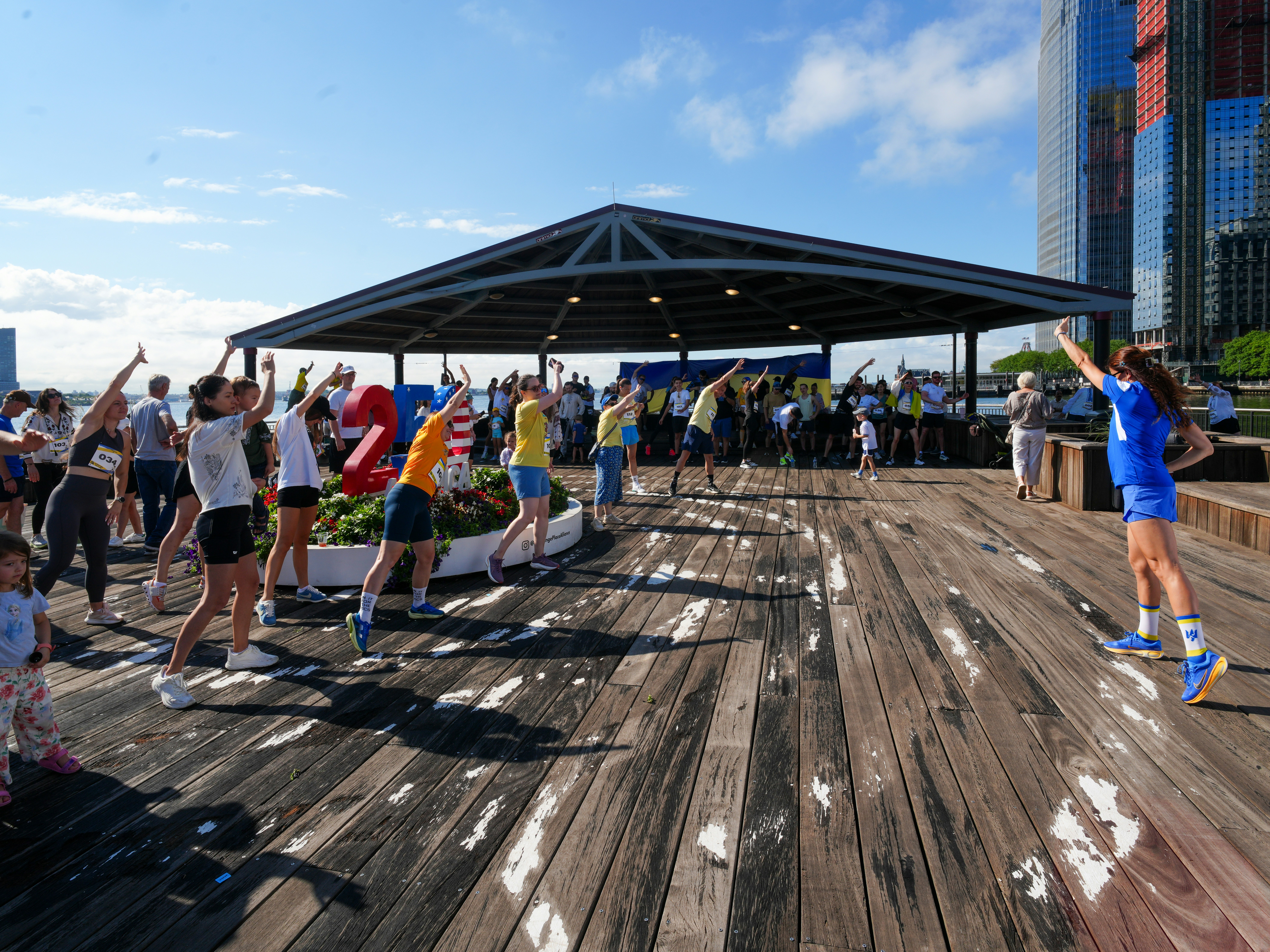 Group stretching on a timber deck