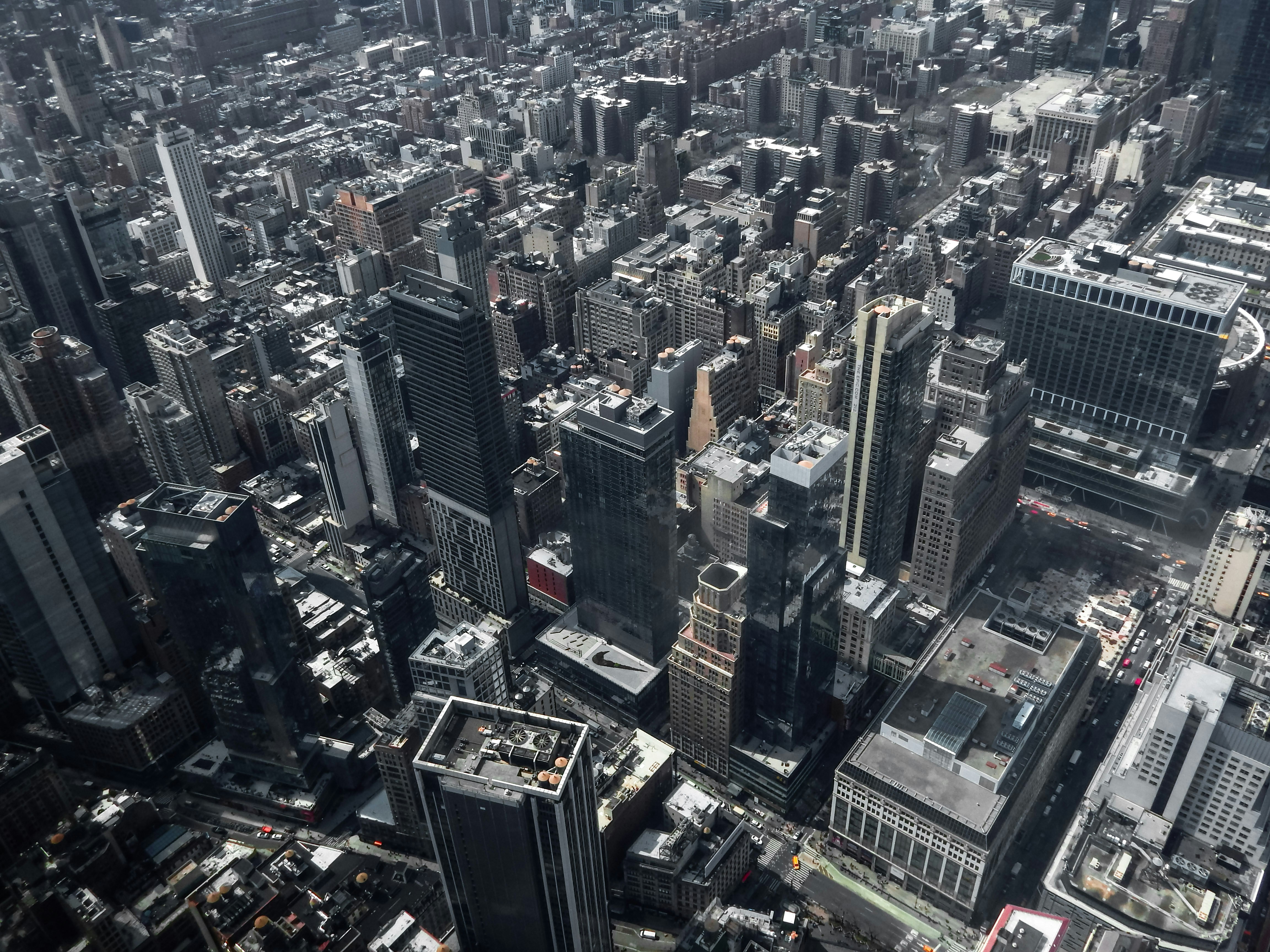 An aerial view of skyscrapers and city streets in New York City