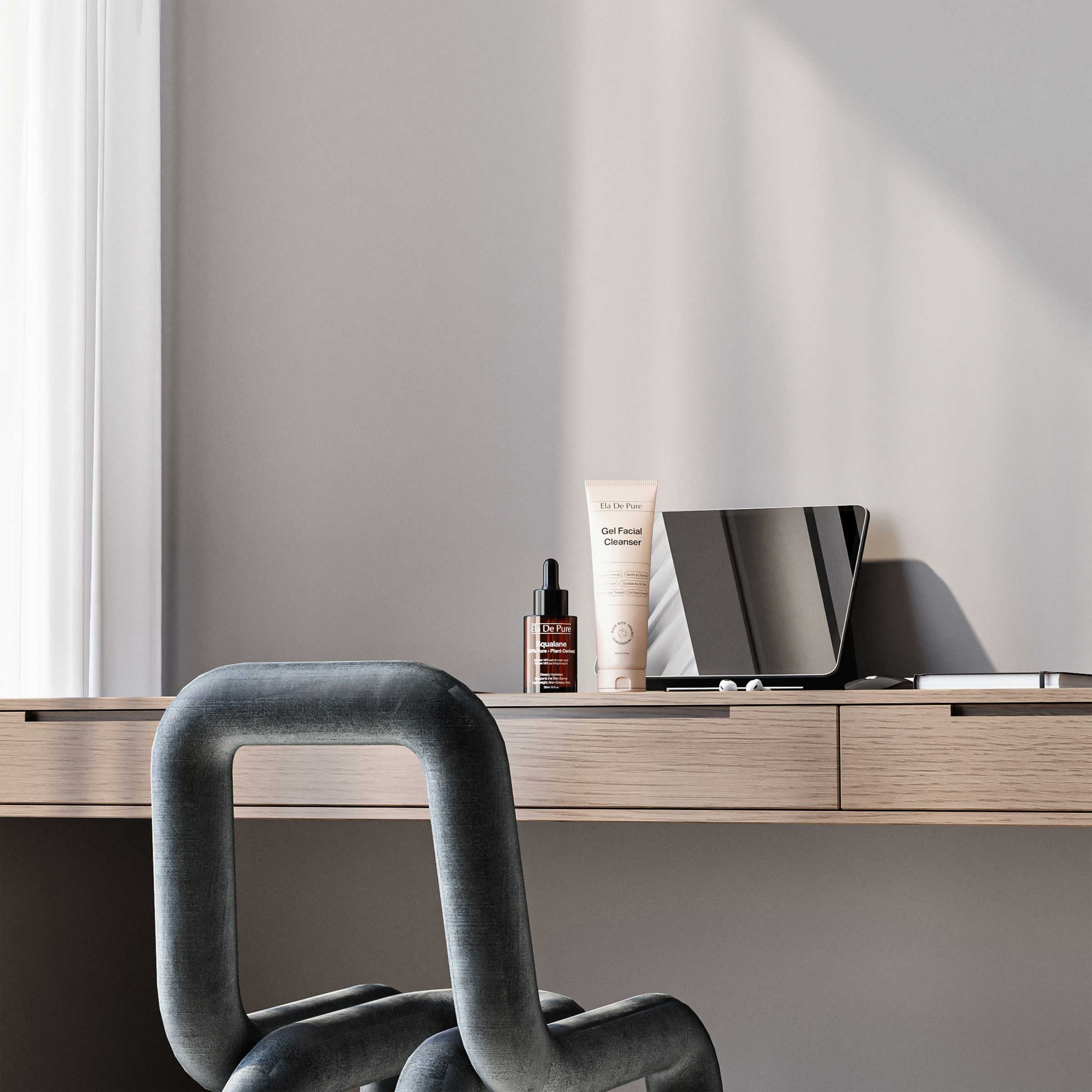 Skincare products on a wooden desk with a modern chair in a sunlit room