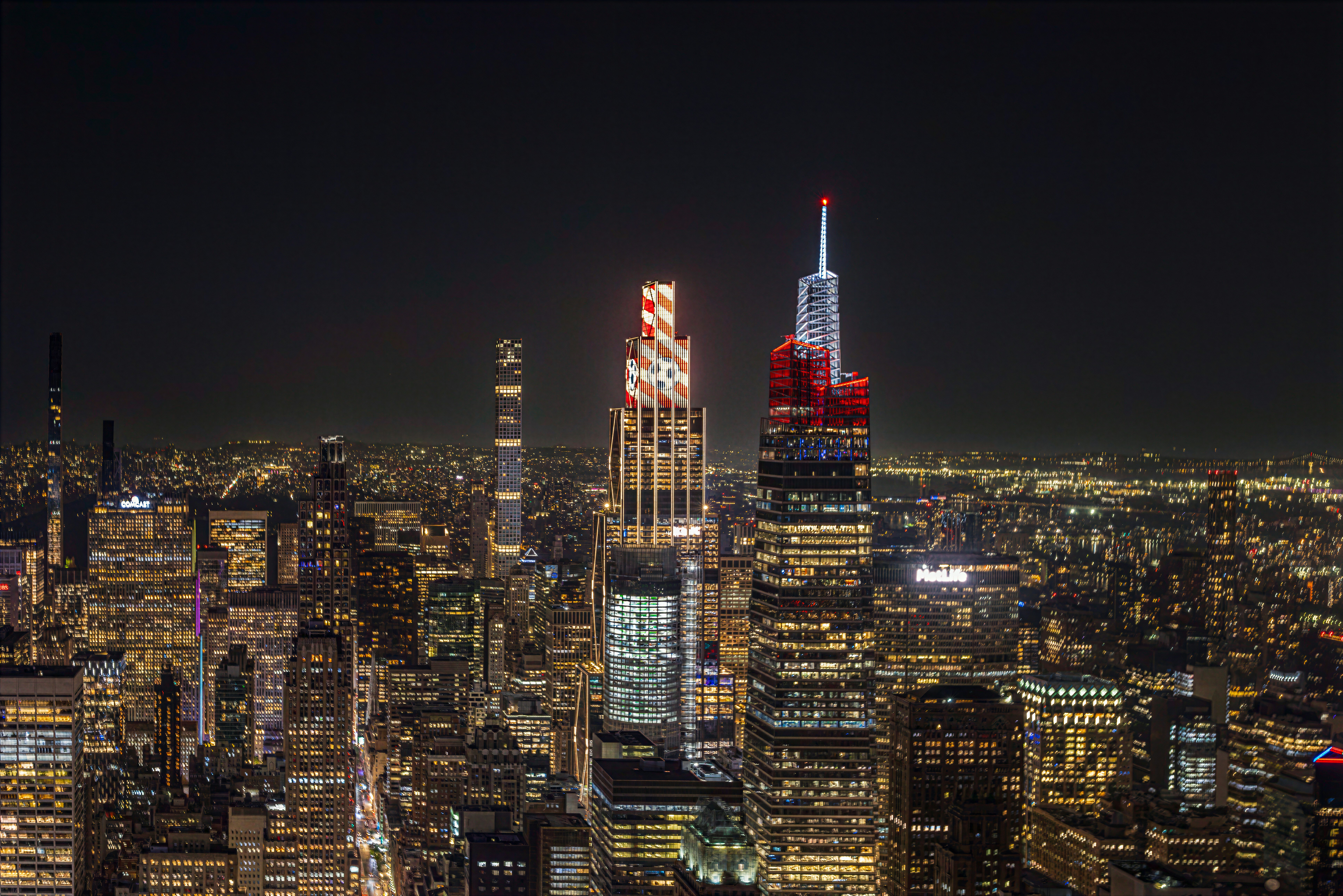 Illuminated skyscrapers in the New York City skyline at night