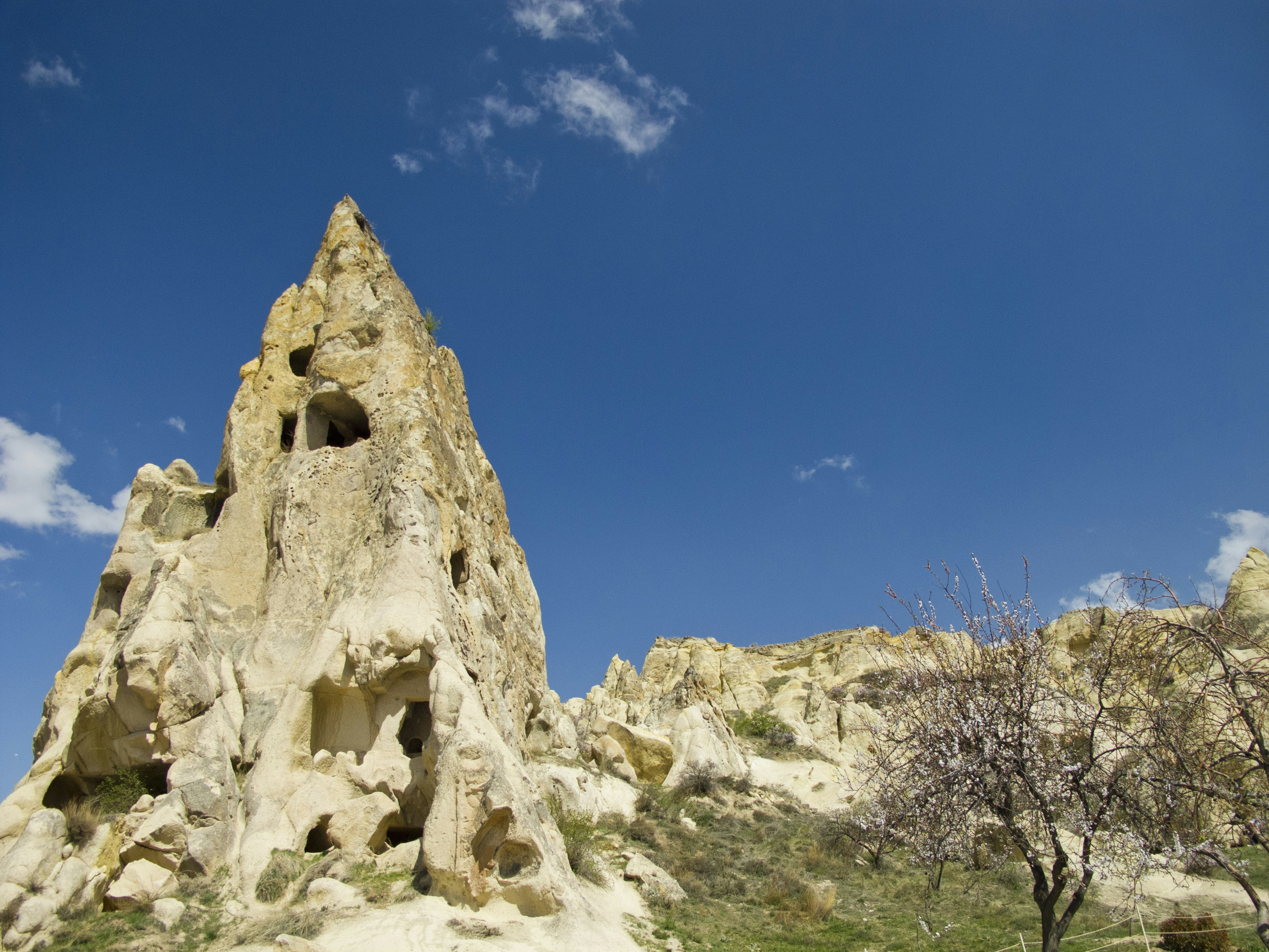 Rock formation with caves in Cappadocia - Free Photo on Unsplash