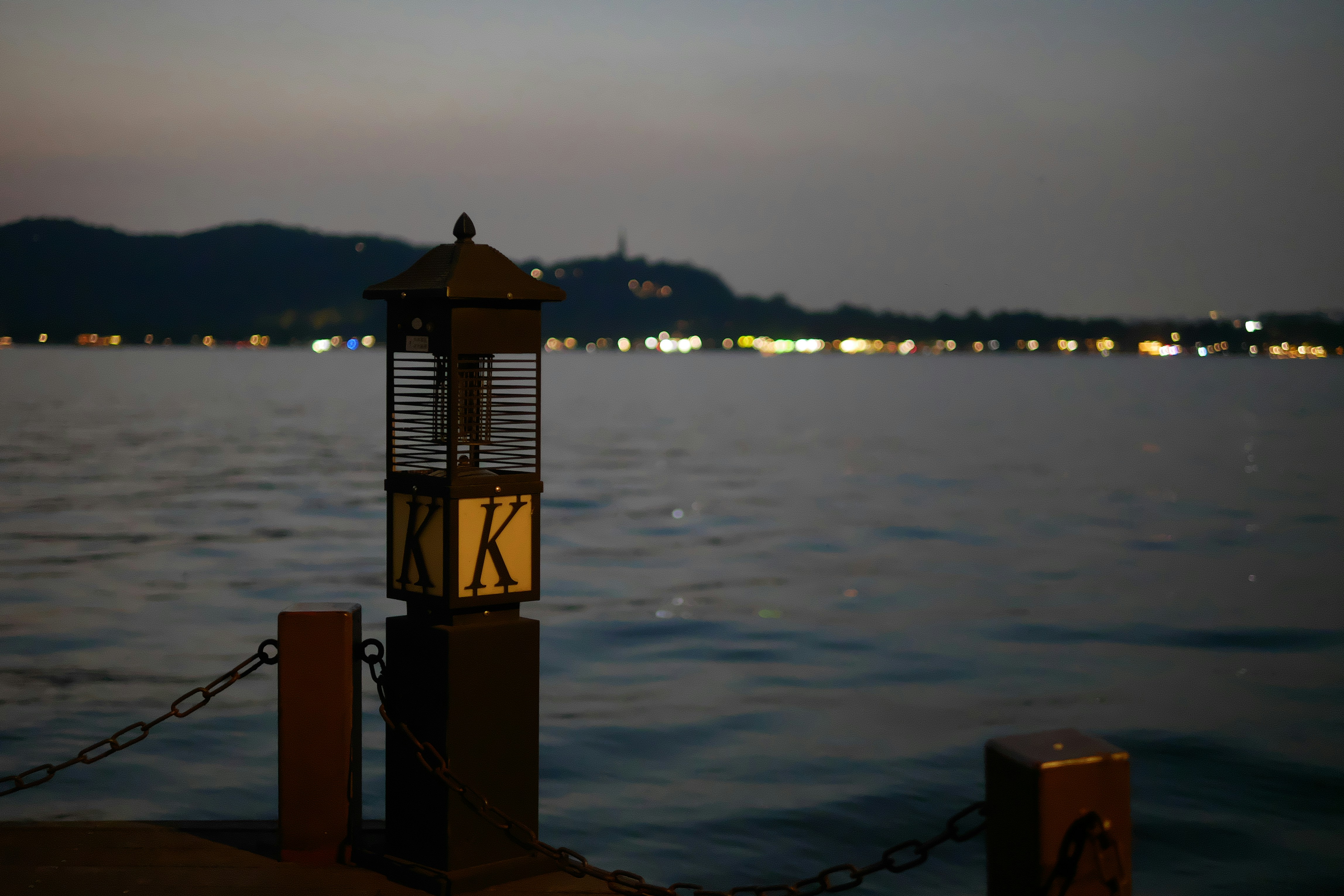 Lamp post with letter K on pier - Free Photo on Unsplash