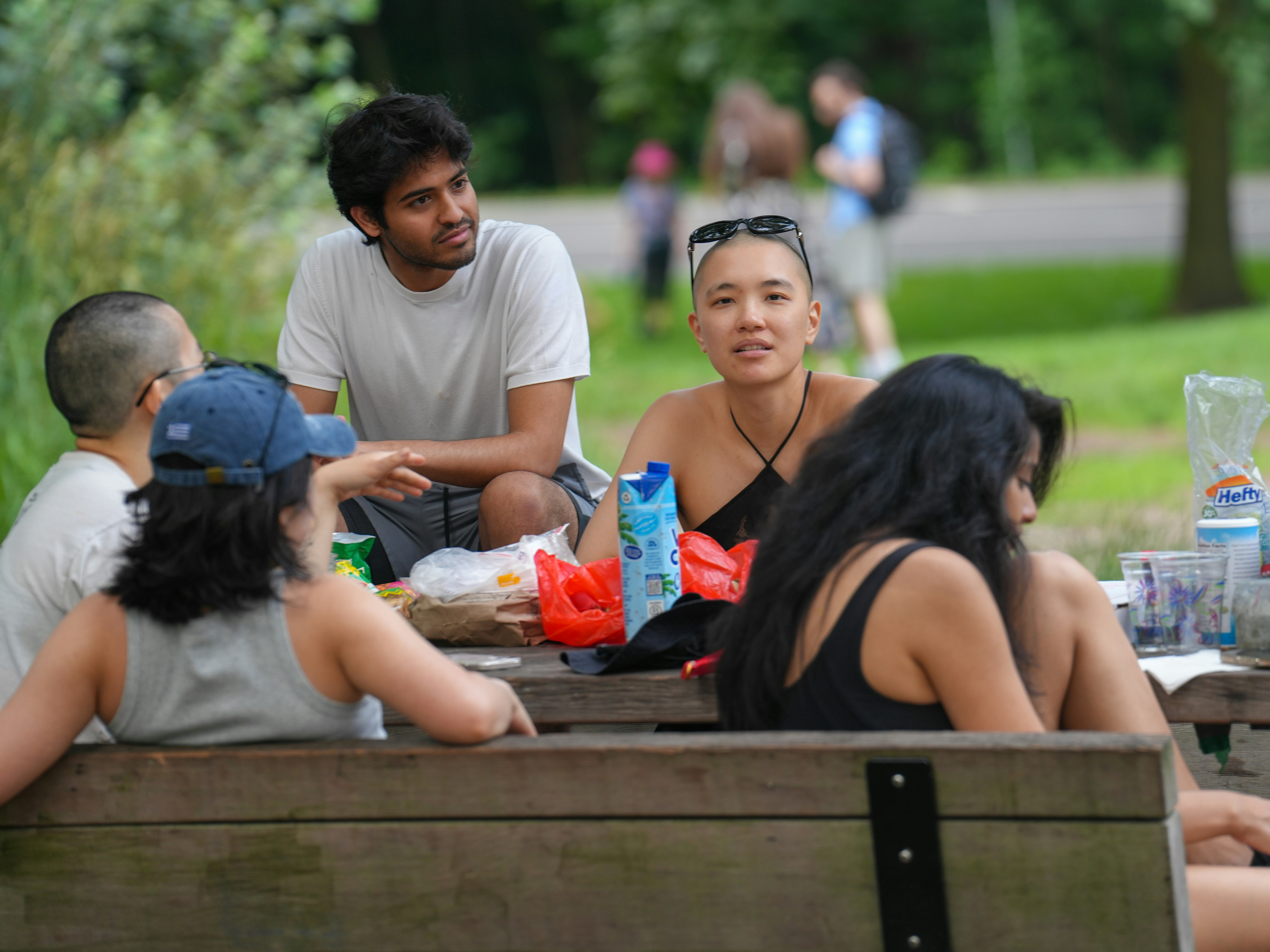 A family sharing a picnic in a park