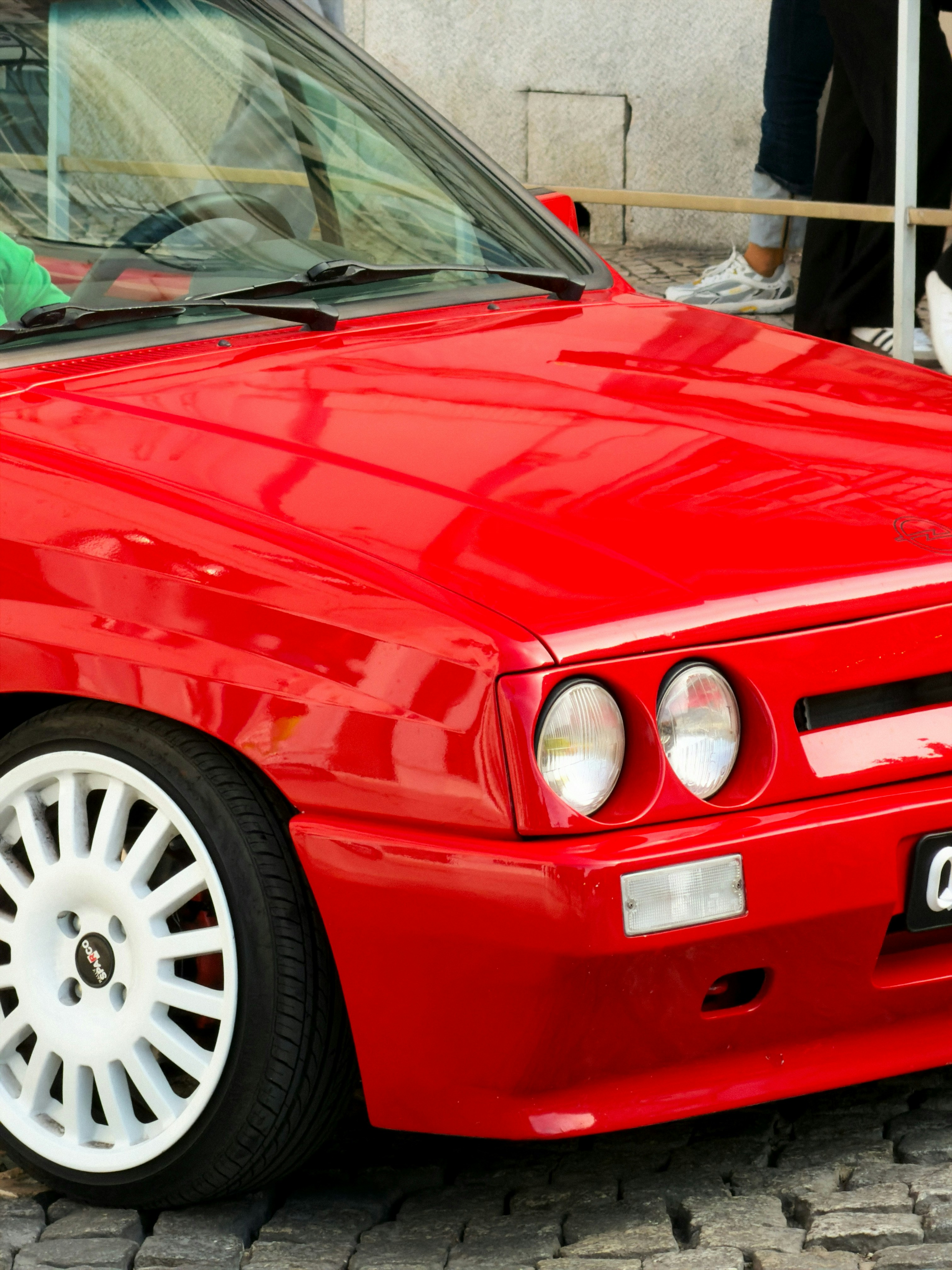 Red car with white wheels - Free Photo on Unsplash