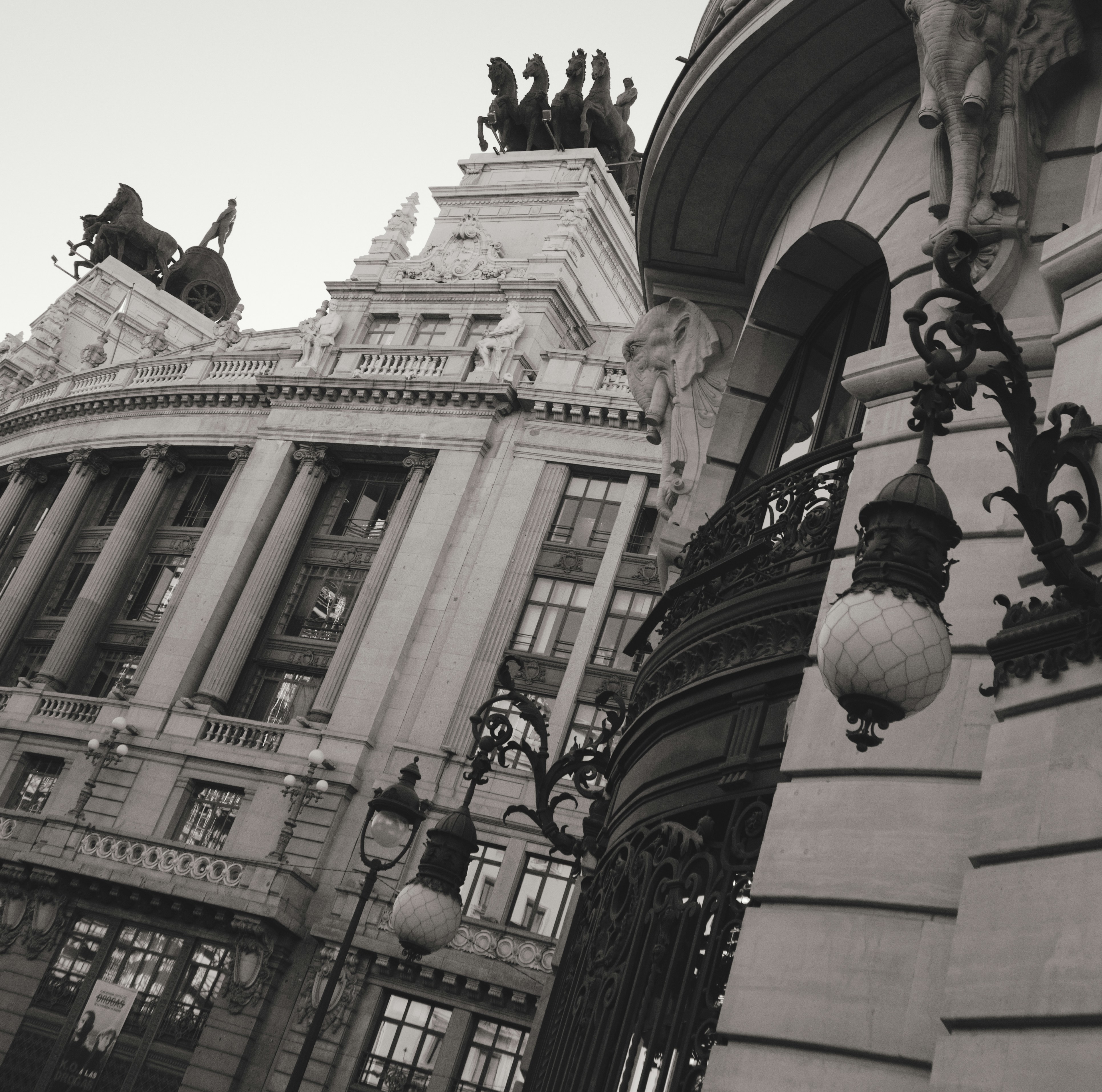 The Metropolis building with its iconic winged statue in Madrid, Spain