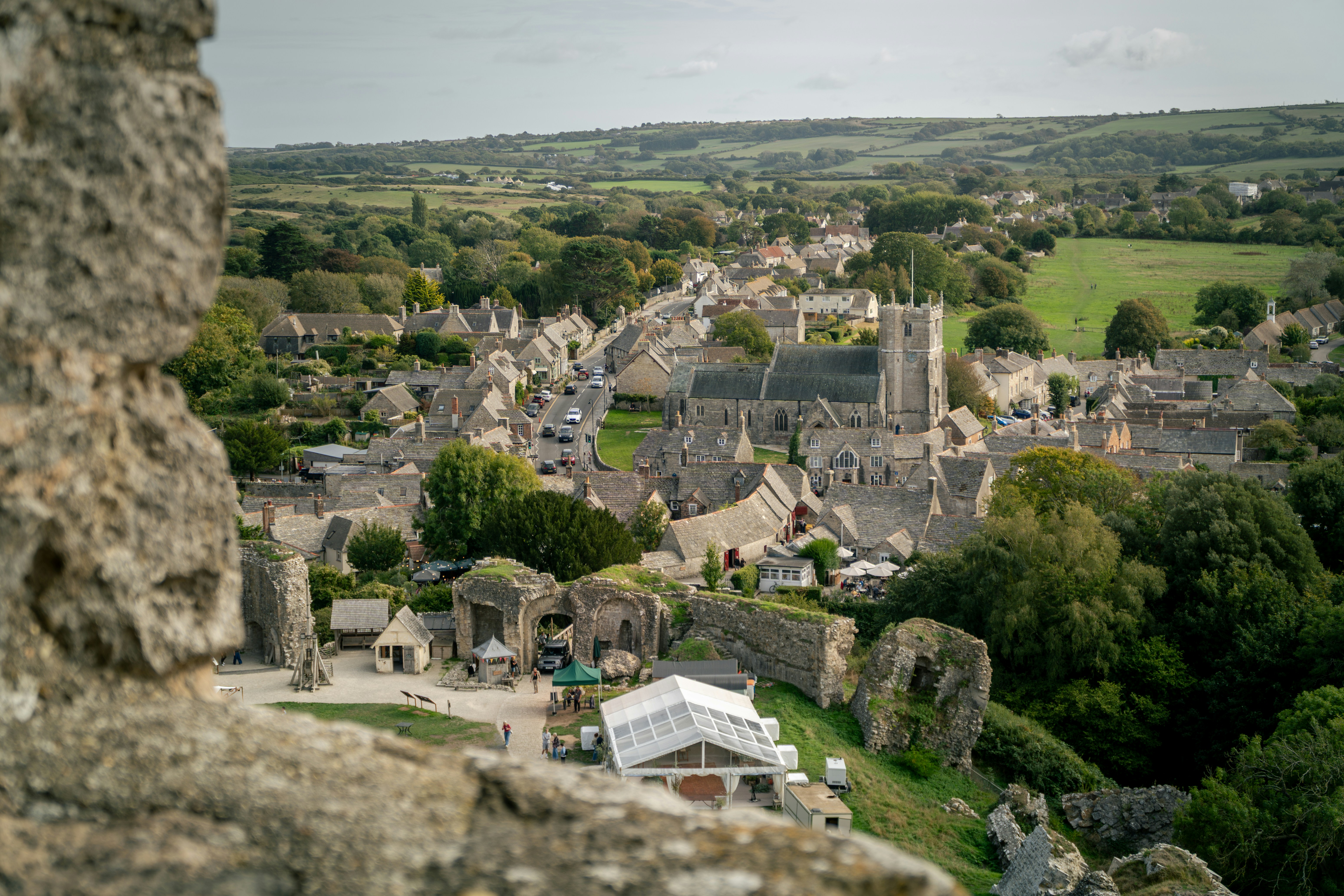 A view of Corfe Castle ruins overlooking the village of Corfe Castle in Dorset