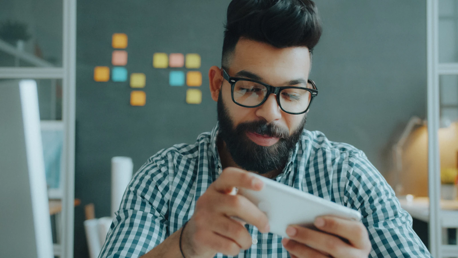 Man looking at his smartphone
