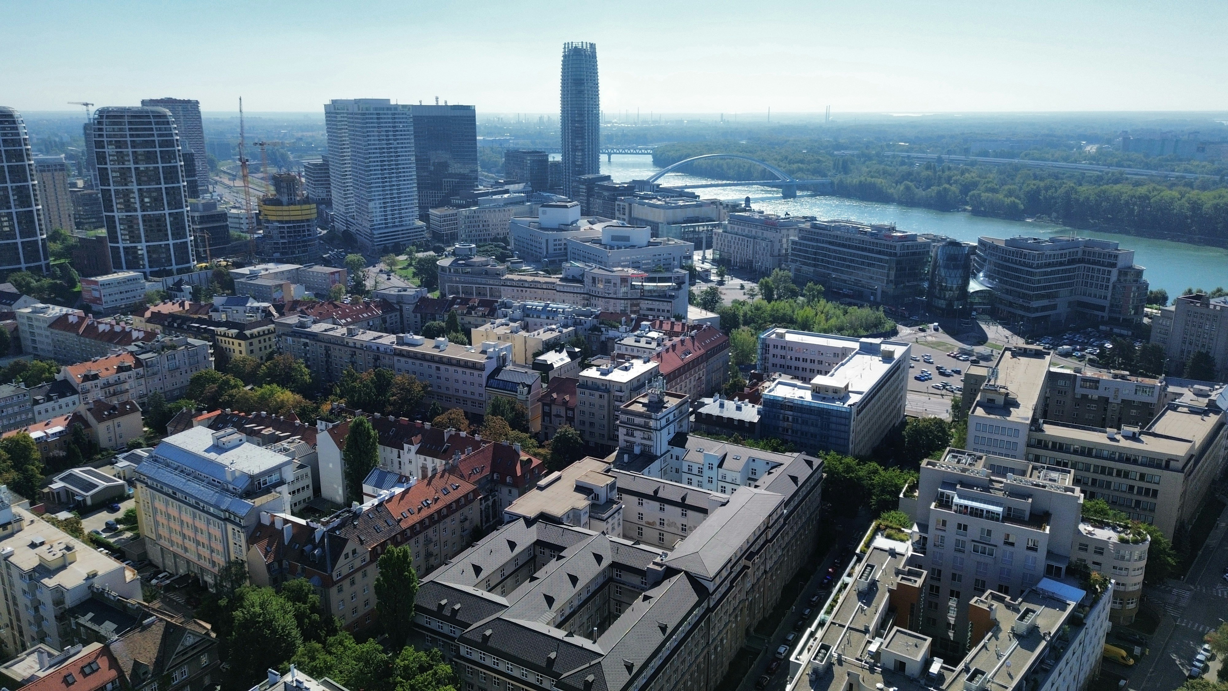 Aerial view of the Bratislava skyline with the Danube river and Apollo bridge