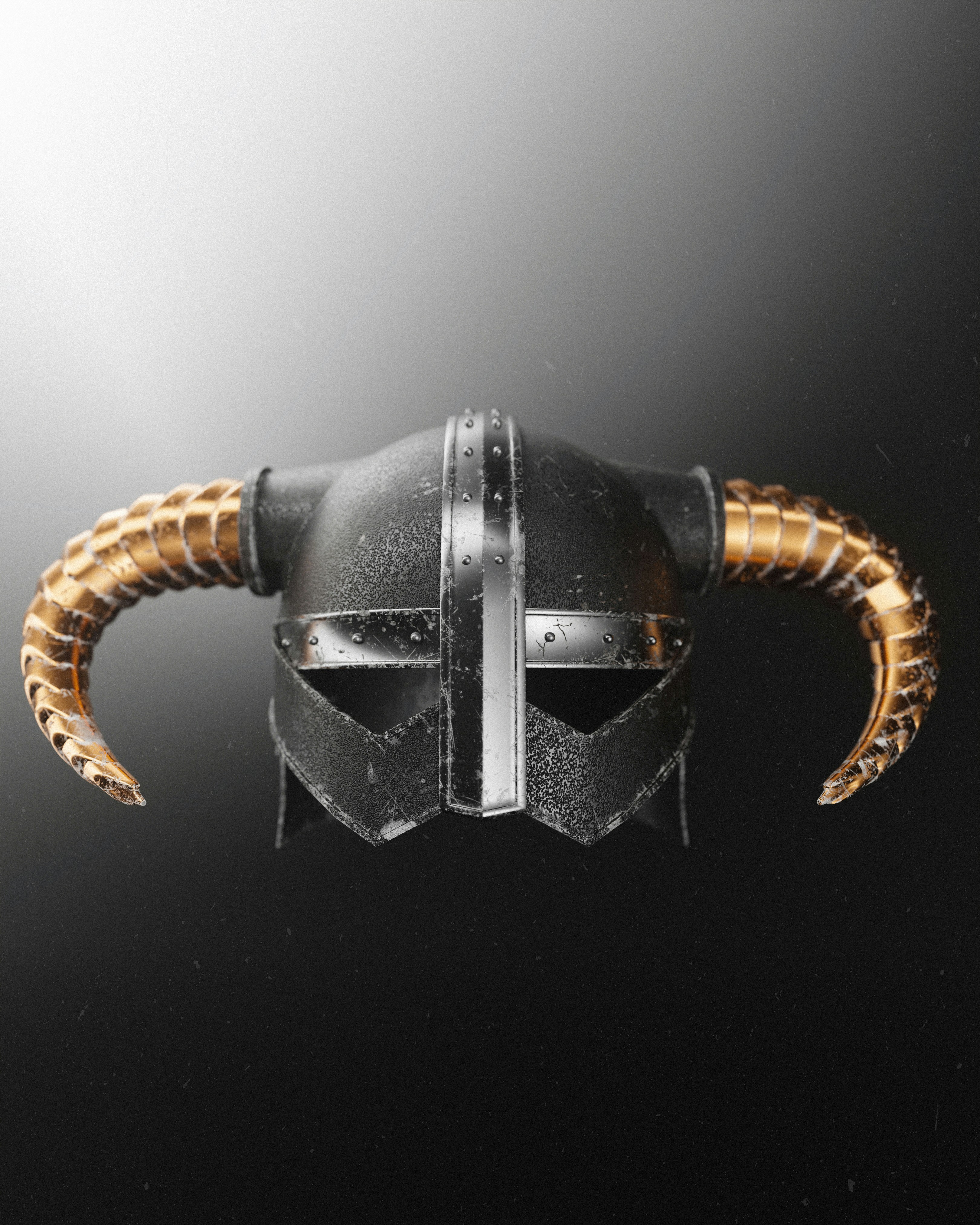 A weathered black metal helmet with large curved gold horns on a dark background