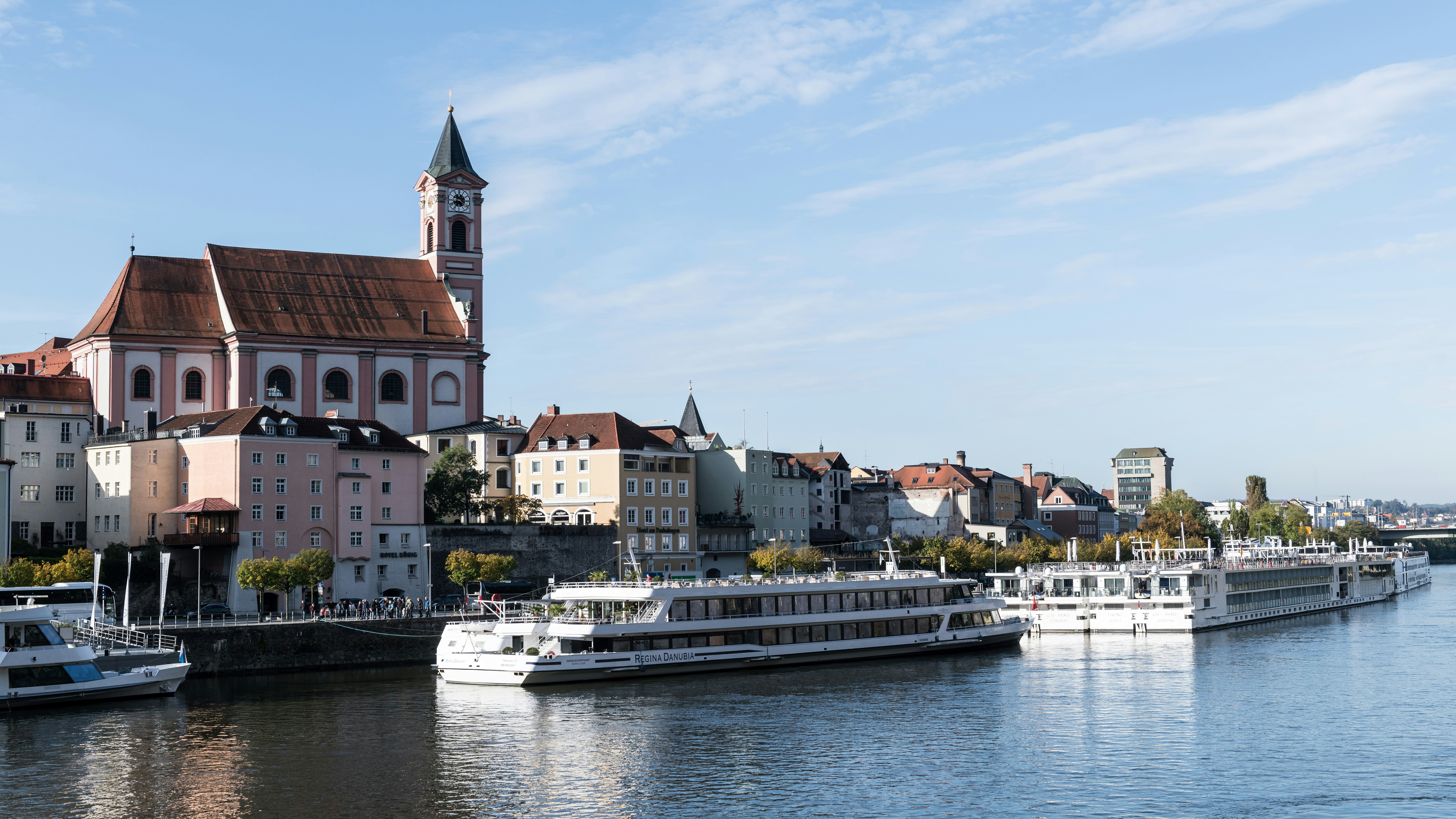 River cruise ships docked along the Danube river in Passau, Germany