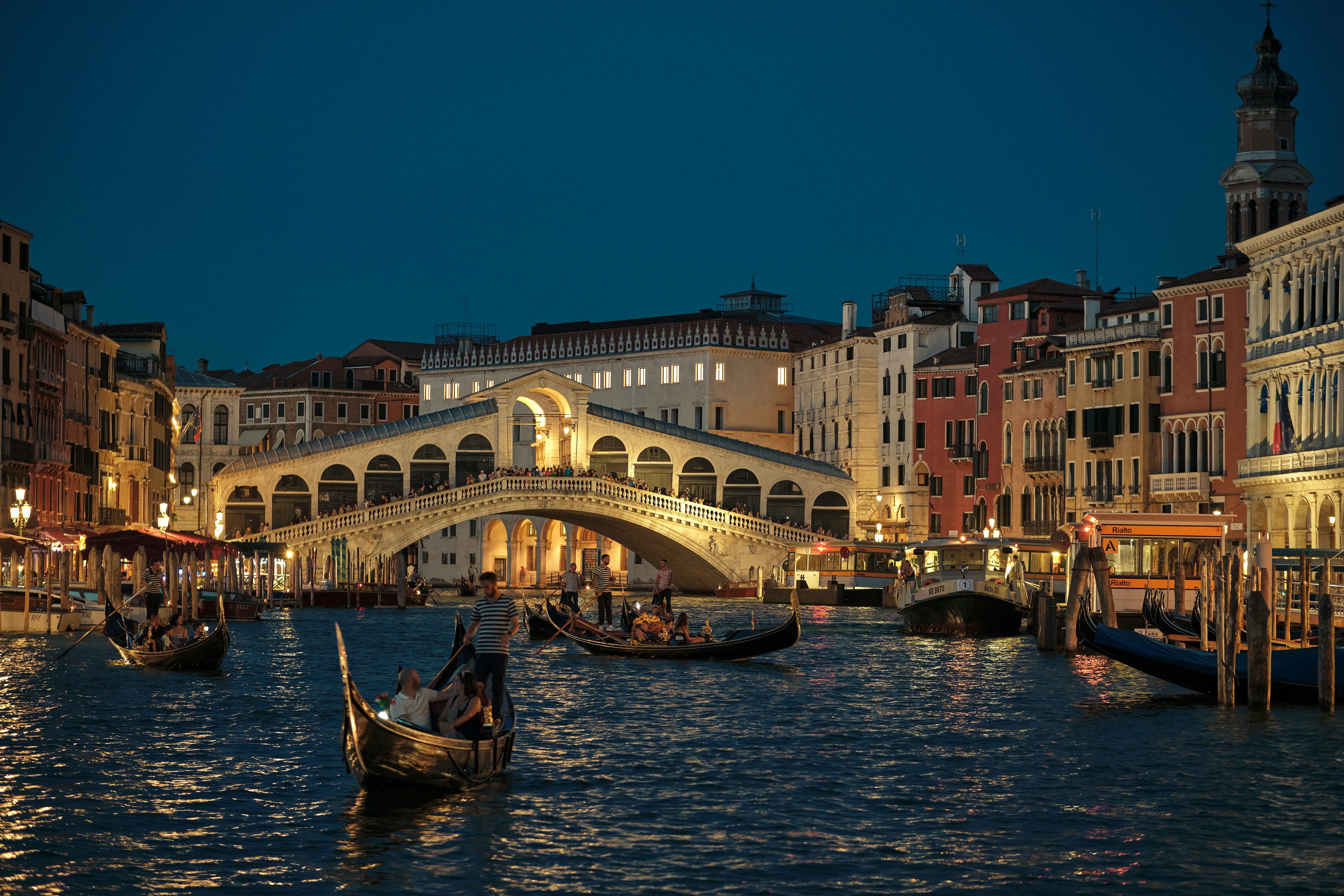 Gondolas on the Grand Canal in front of the Rialto Bridge in Venice