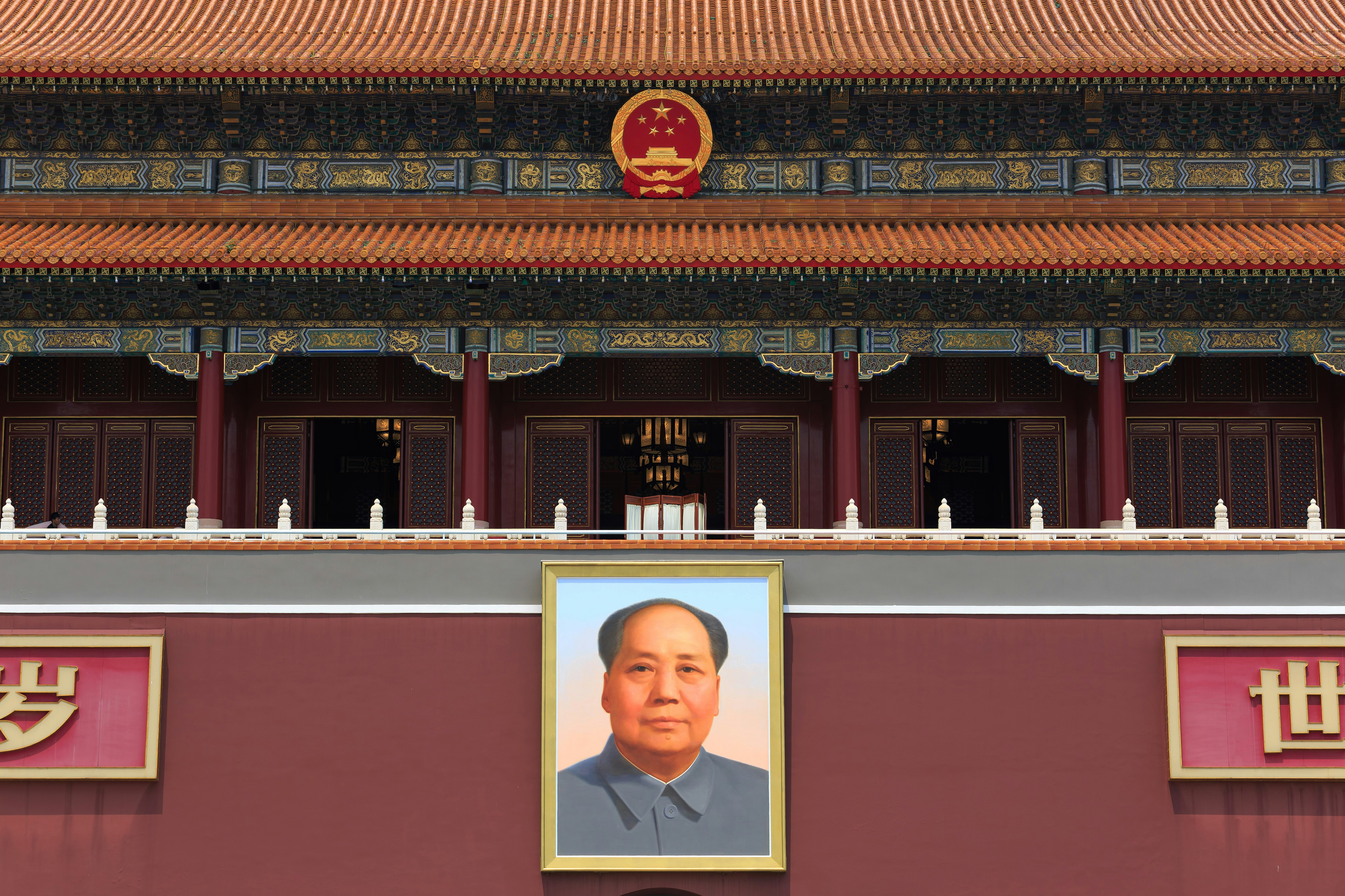 The portrait of Mao Zedong on the red wall of the Tiananmen gate in Beijing