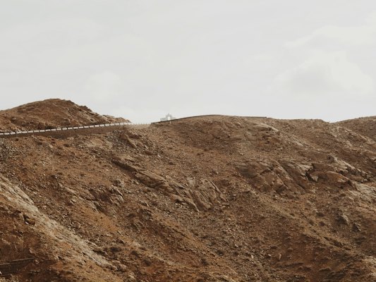 A road along a bare mountain ridge — Fuerteventura, Spain