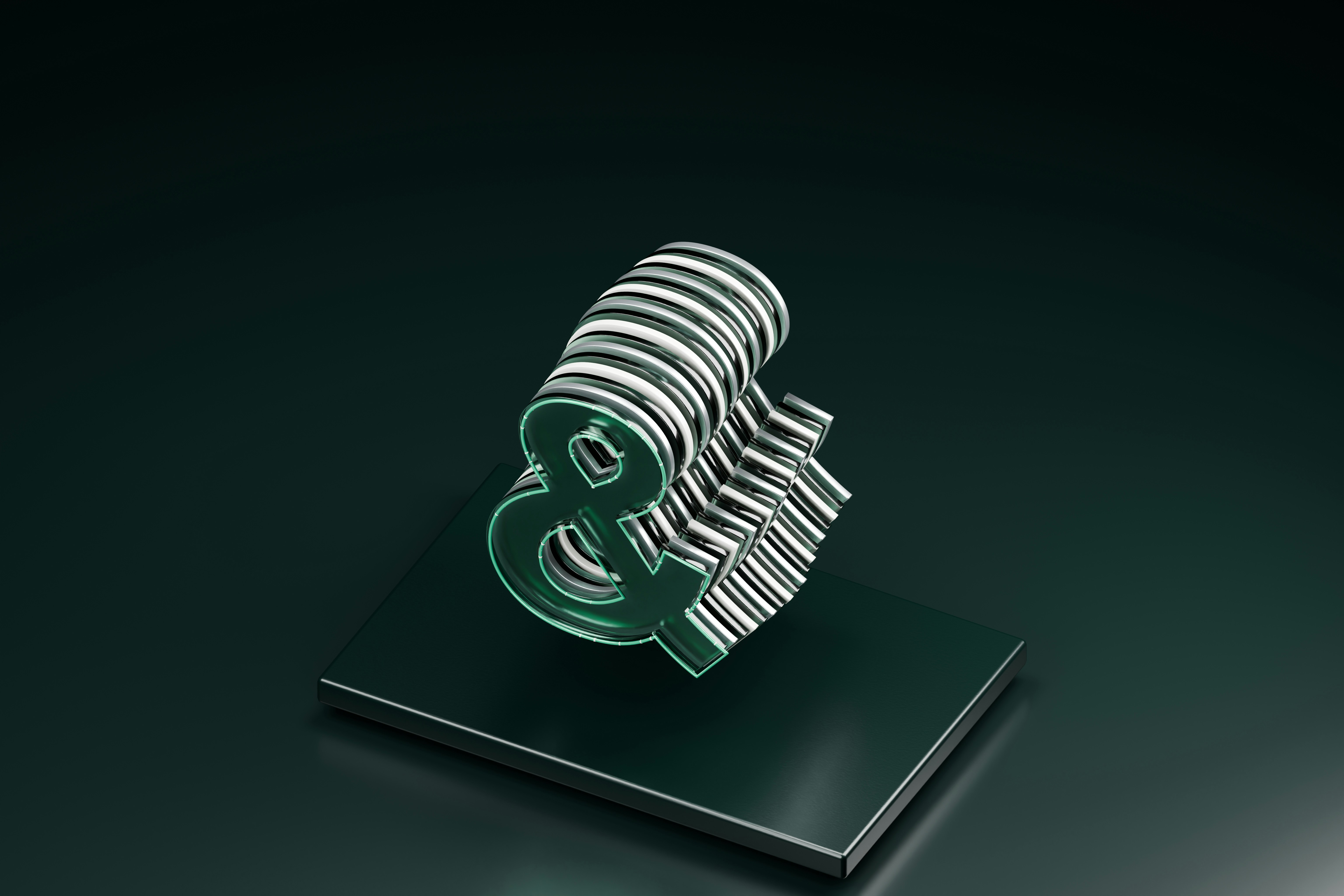 A layered glass ampersand symbol on a dark green rectangular base