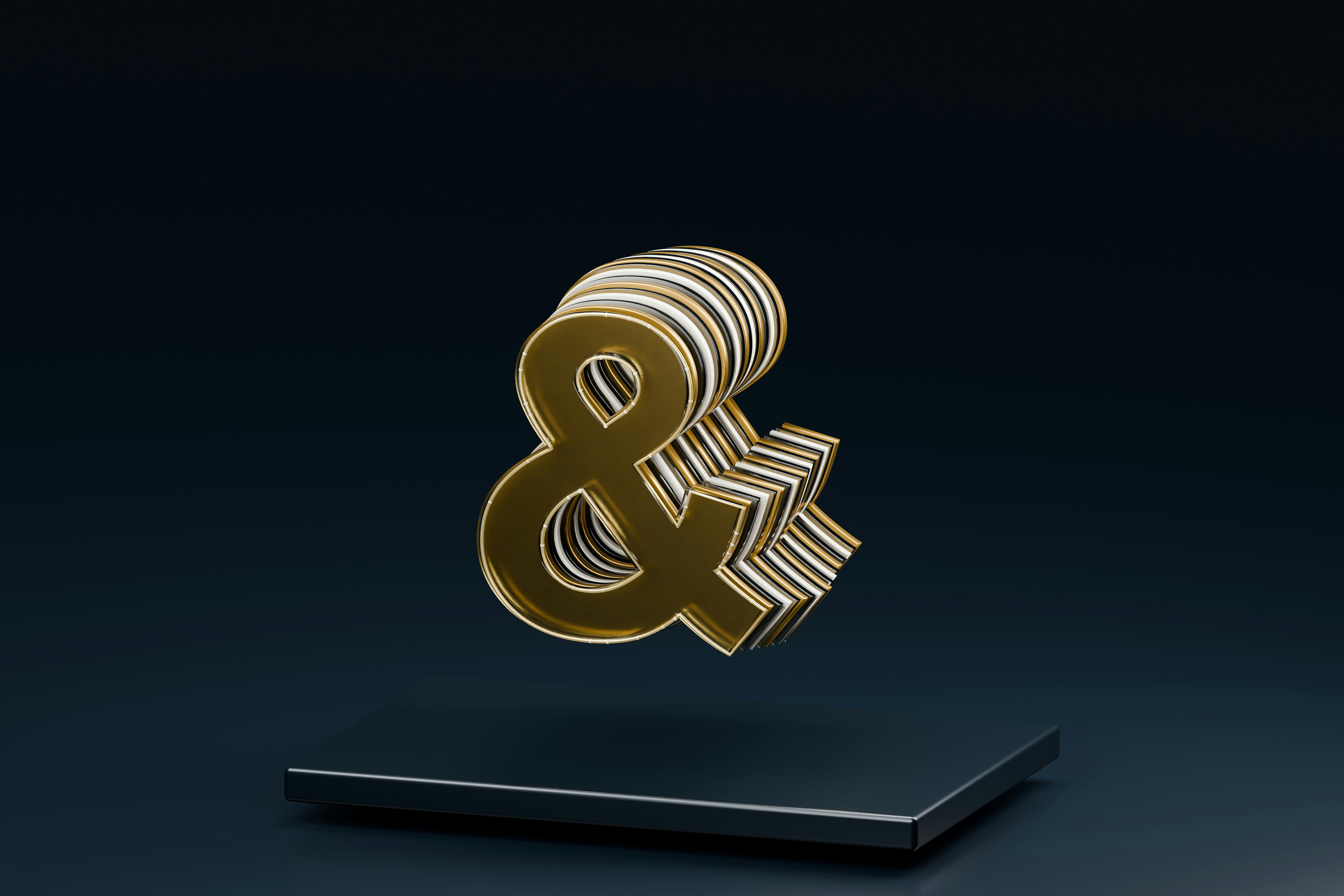 Um símbolo de ampersand em camadas dourado e branco flutuando acima de uma base retangular escura