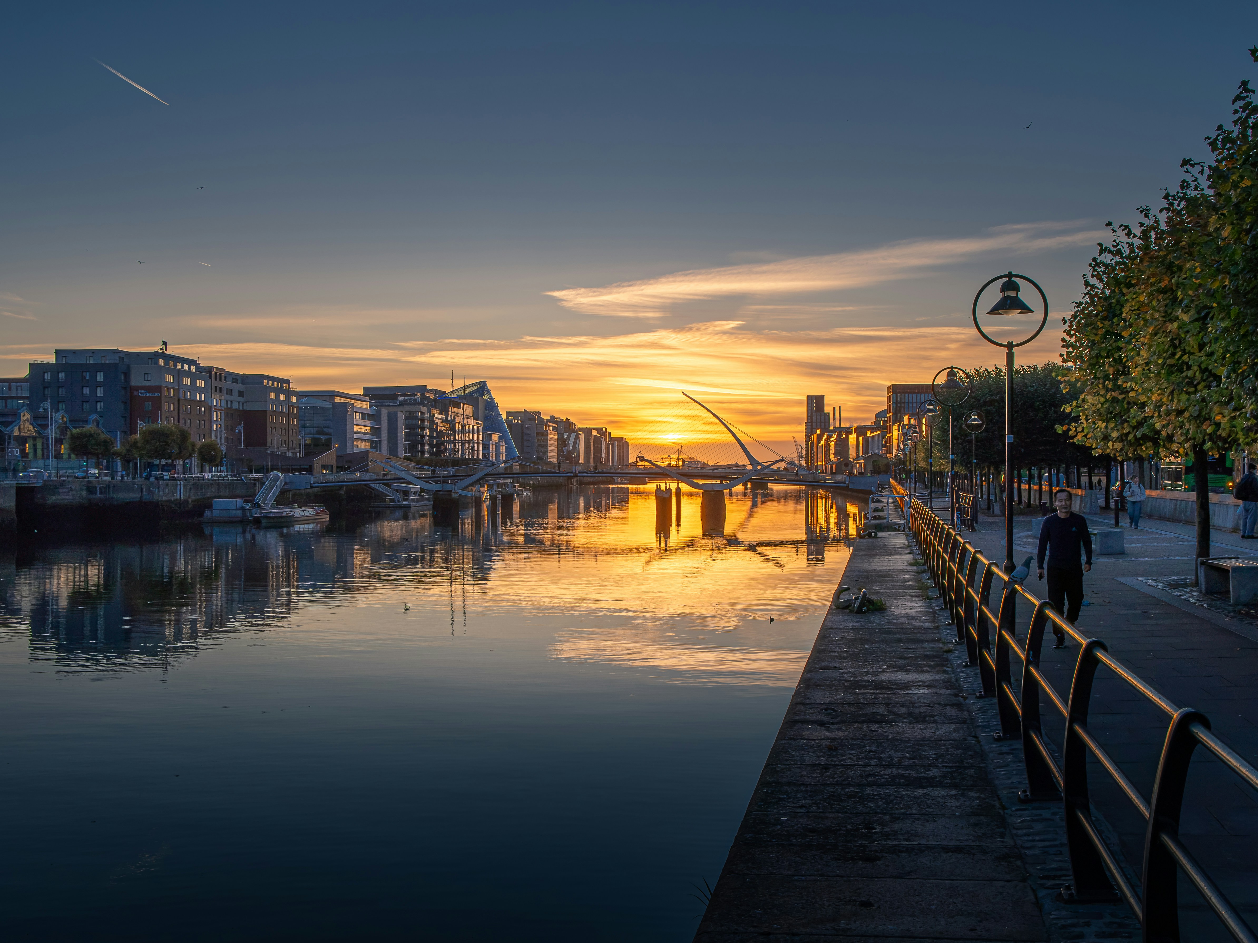 The Samuel Beckett Bridge over the River Liffey in Dublin at low sun