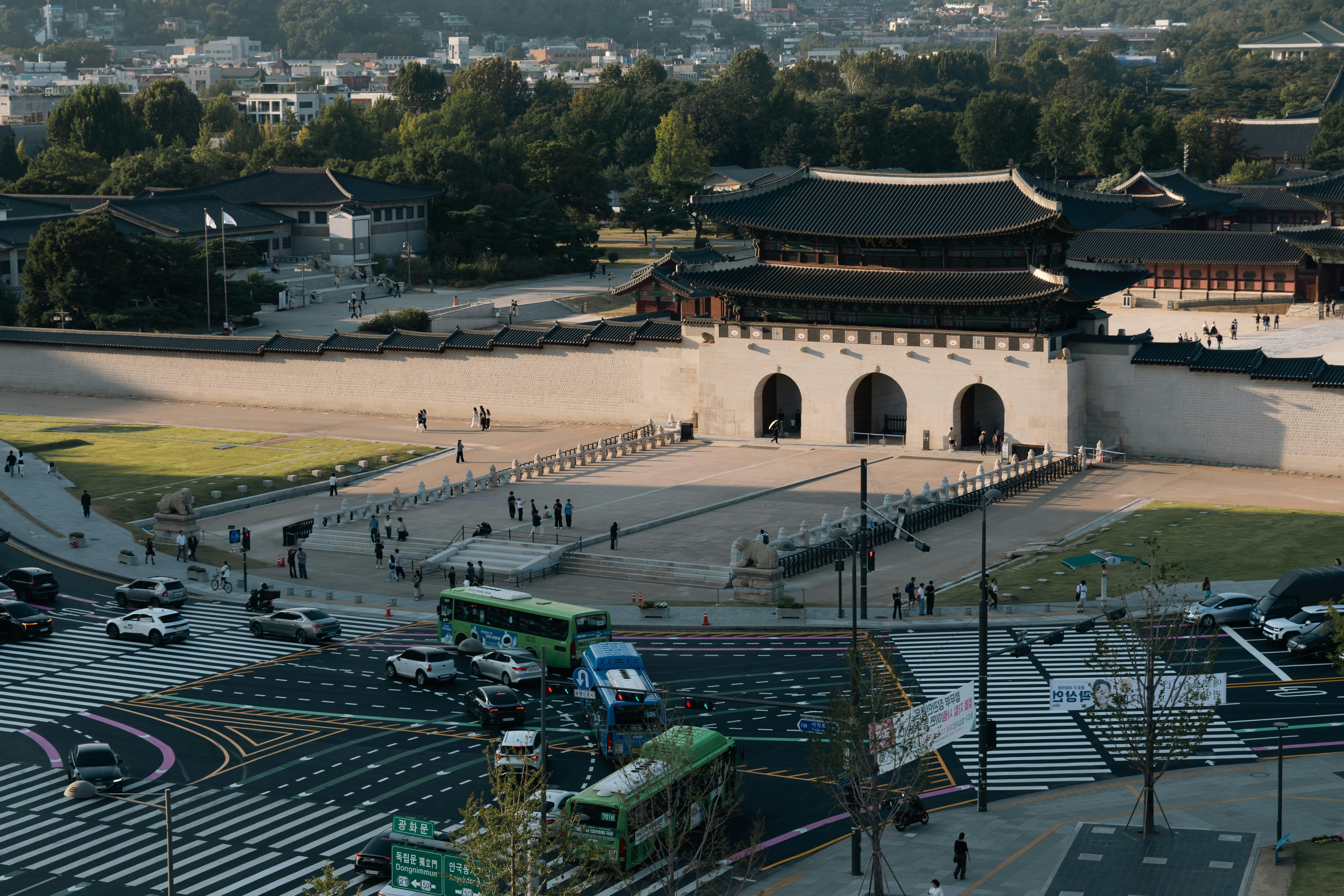 An aerial view of Gwanghwamun gate and a busy intersection in Seoul