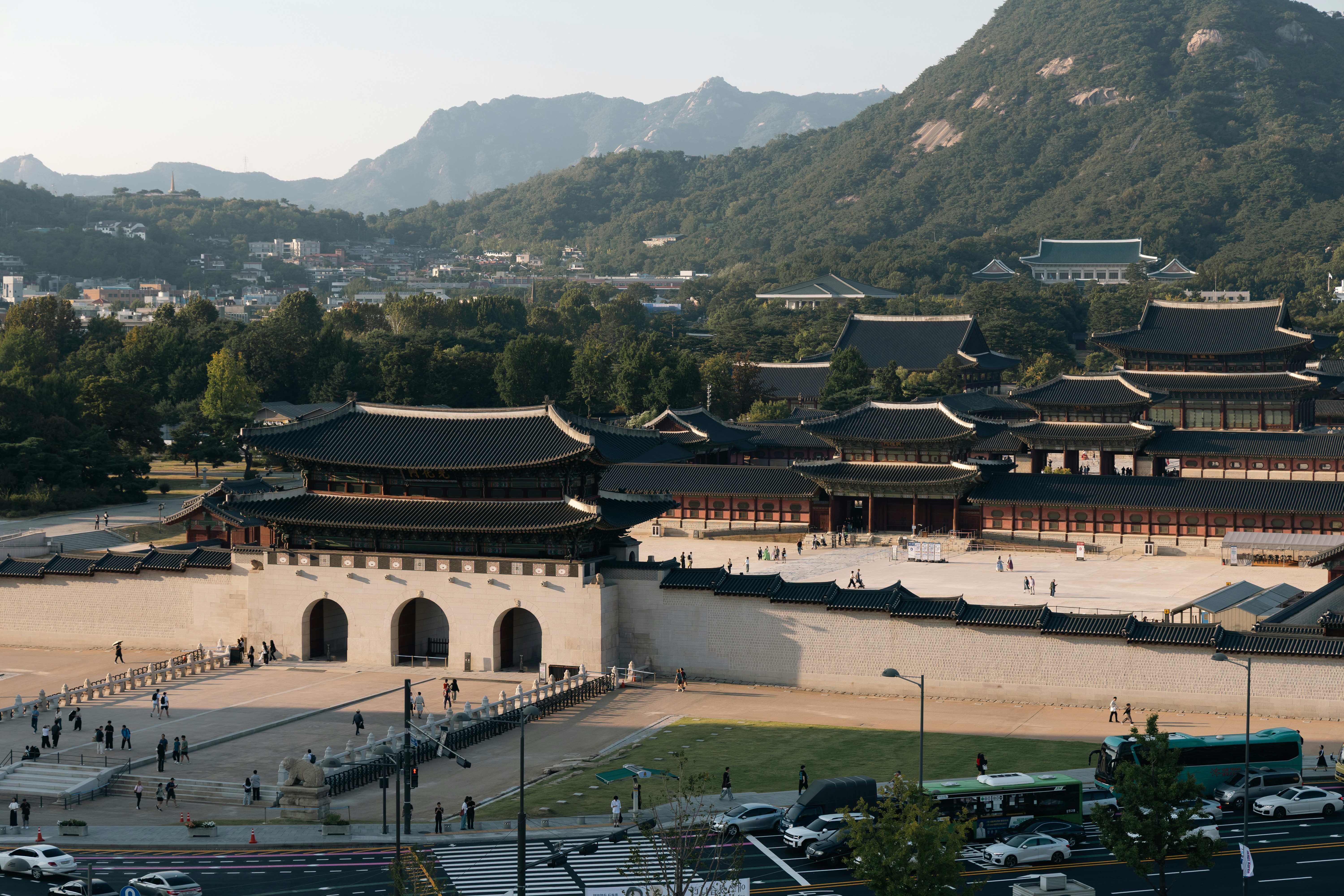 Gyeongbokgung Palace with traditional architecture and mountains in the background in Seoul