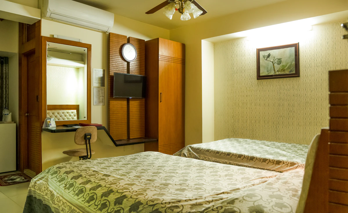 Hotel room with two beds; representative licensed hotel photograph, not the exact property