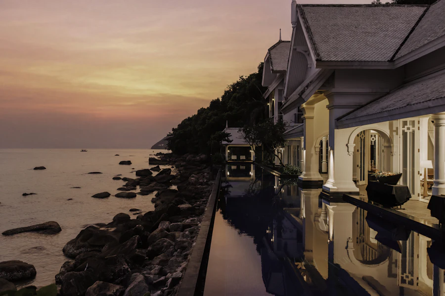 Villa with infinity pool above a rocky coastline