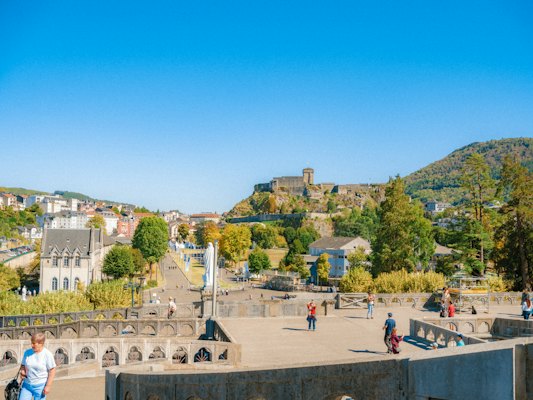 The town and the castle from a terrace — Lourdes, France