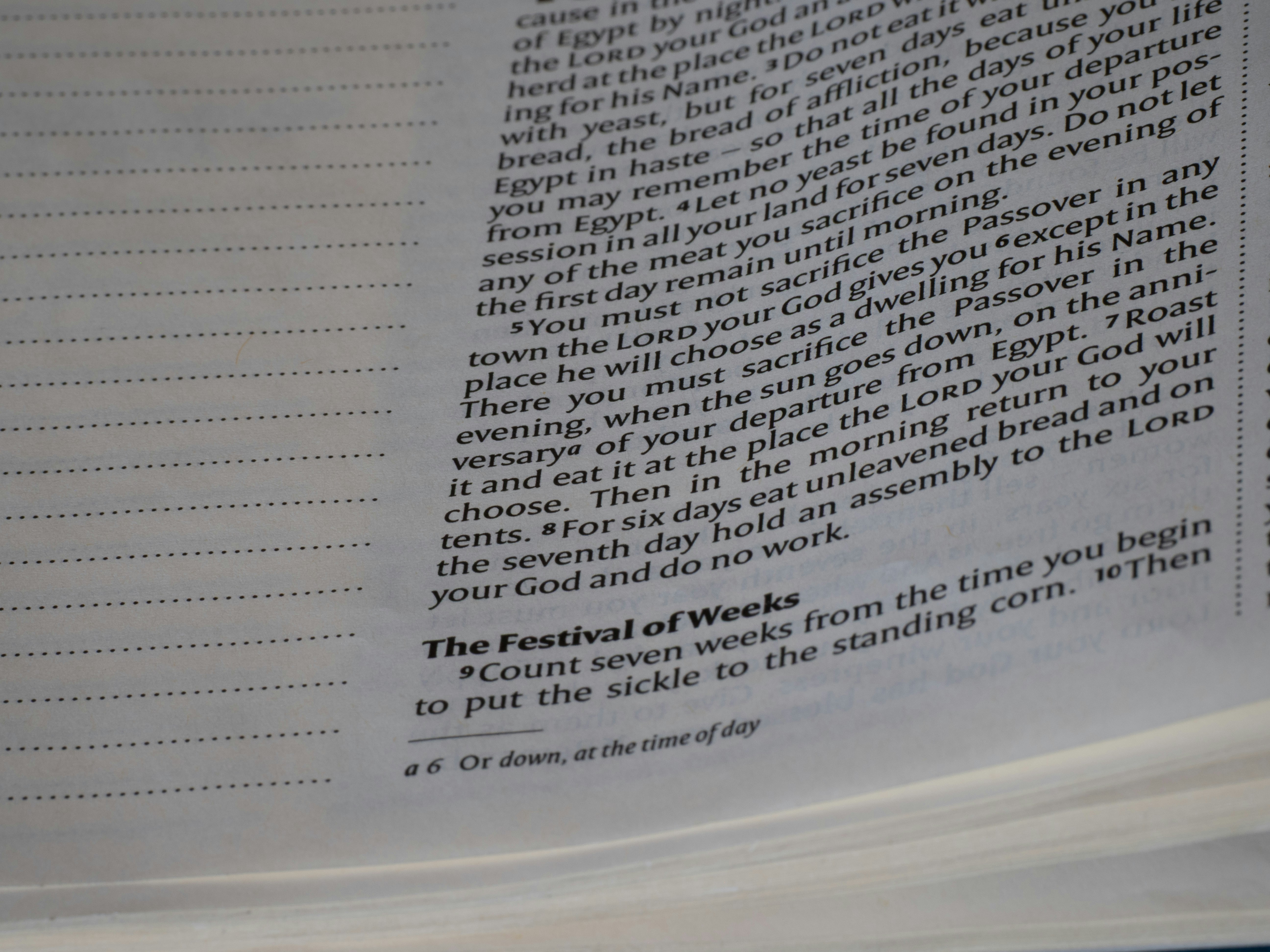 A close-up of printed text on a page from a religious book