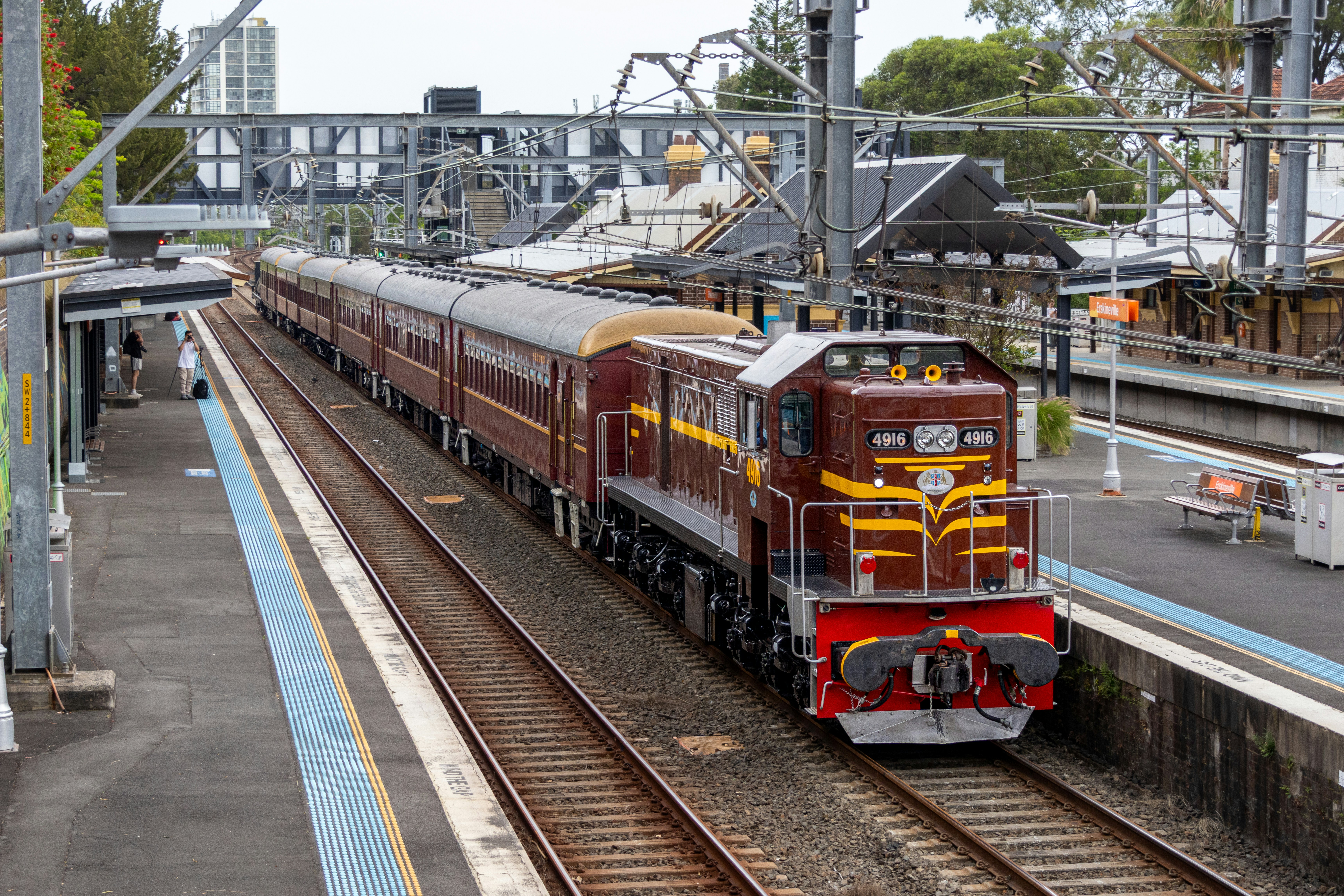 Locomotive 4916 hauls the heritage coaches through Erskineville on 2 October 2026, bound for Eveleigh to stable overnigh