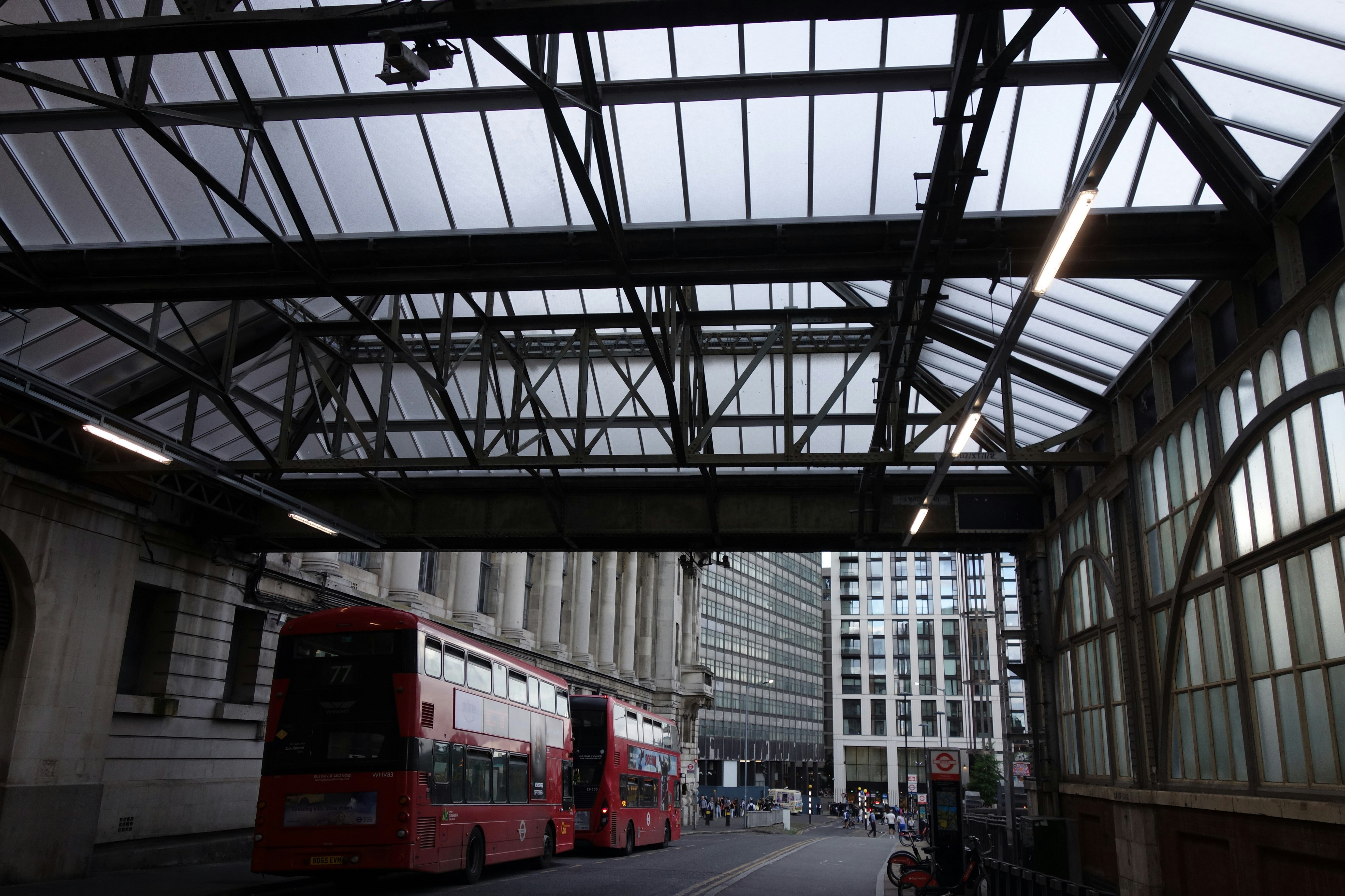 Red double-decker buses under station roof - Free Photo on Unsplash