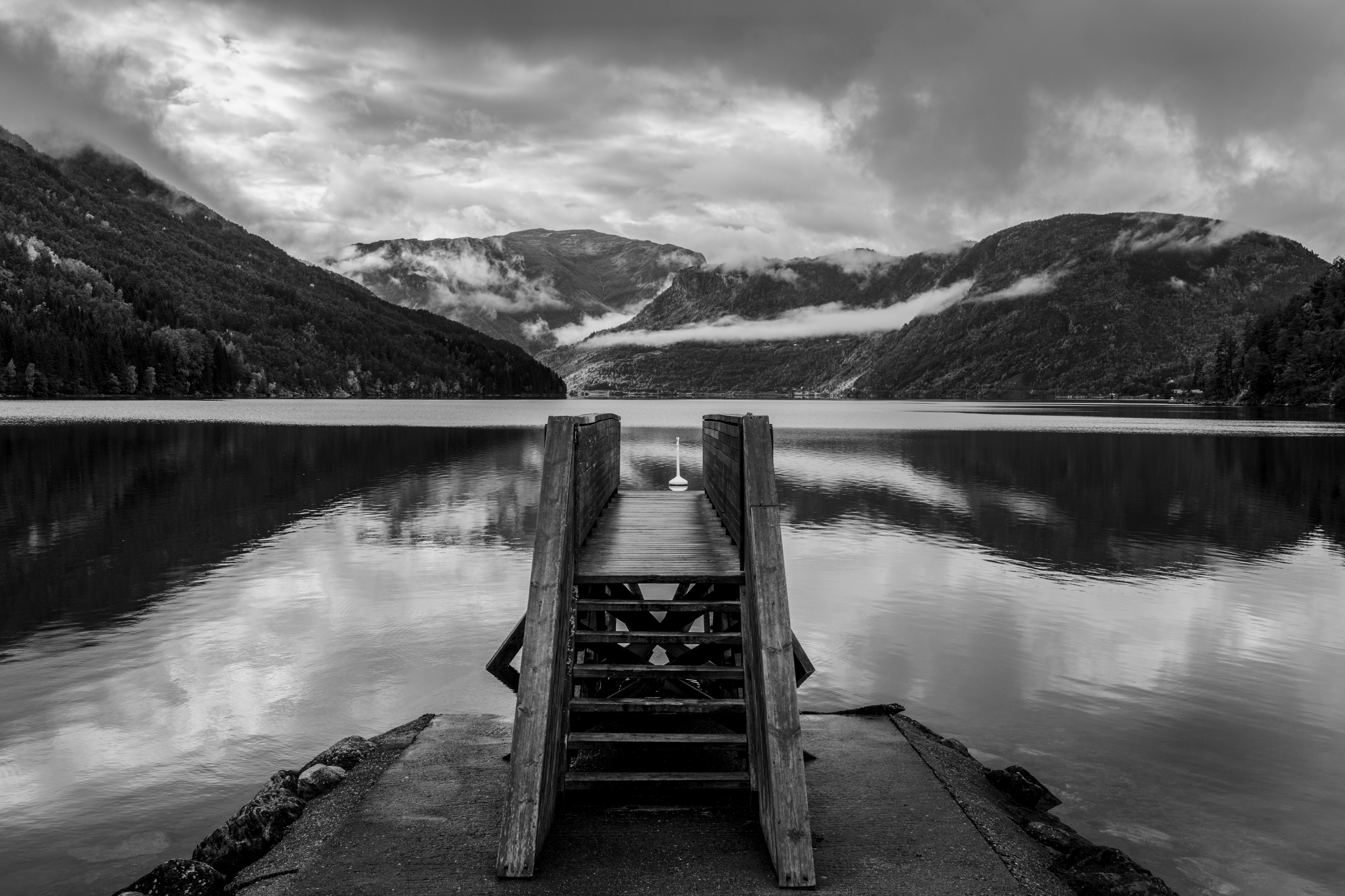 Wooden pier on misty lake - Free Photo on Unsplash