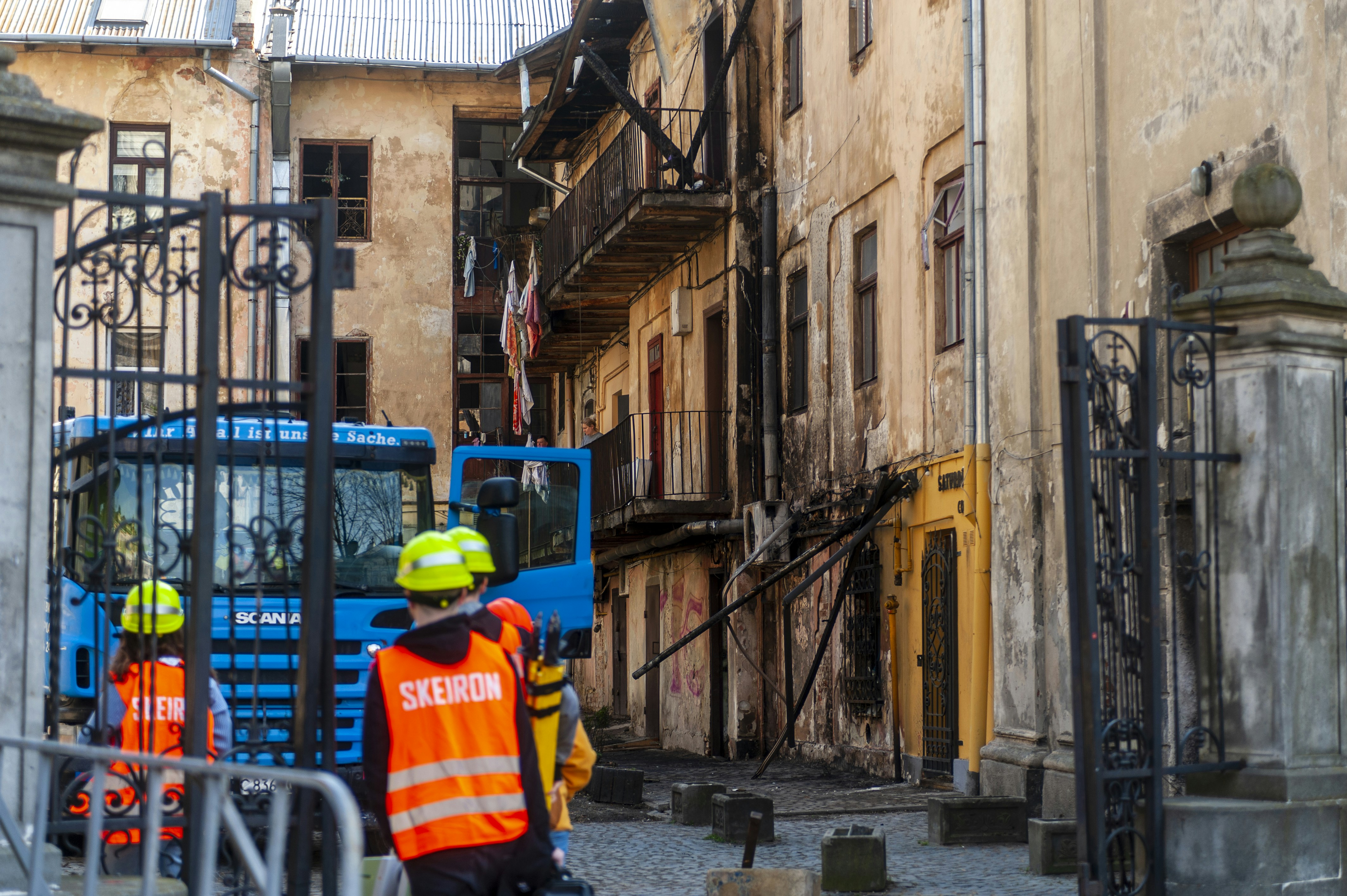 firefighters at building fire scene