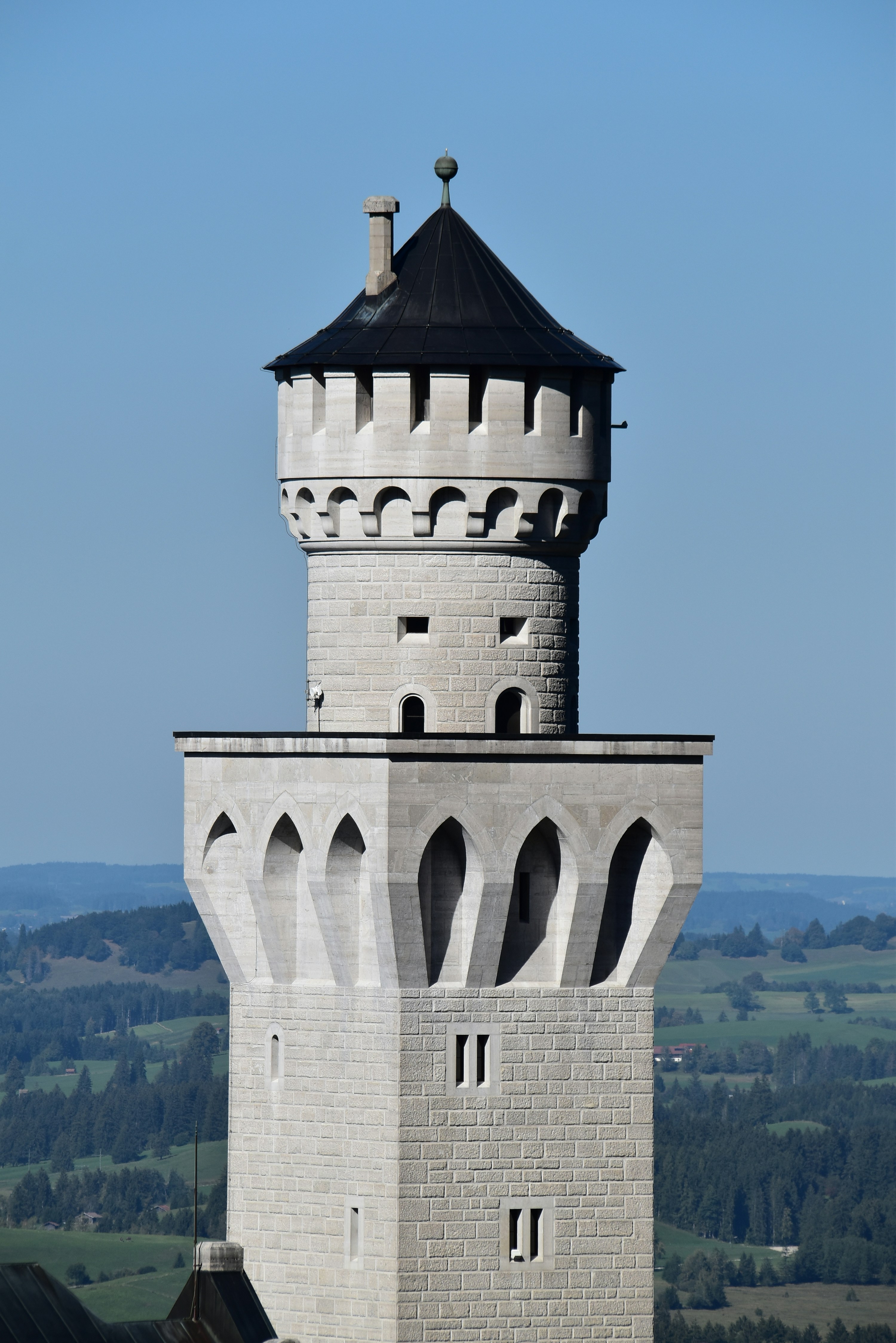 Stone tower overlooking green landscape - Free Photo on Unsplash
