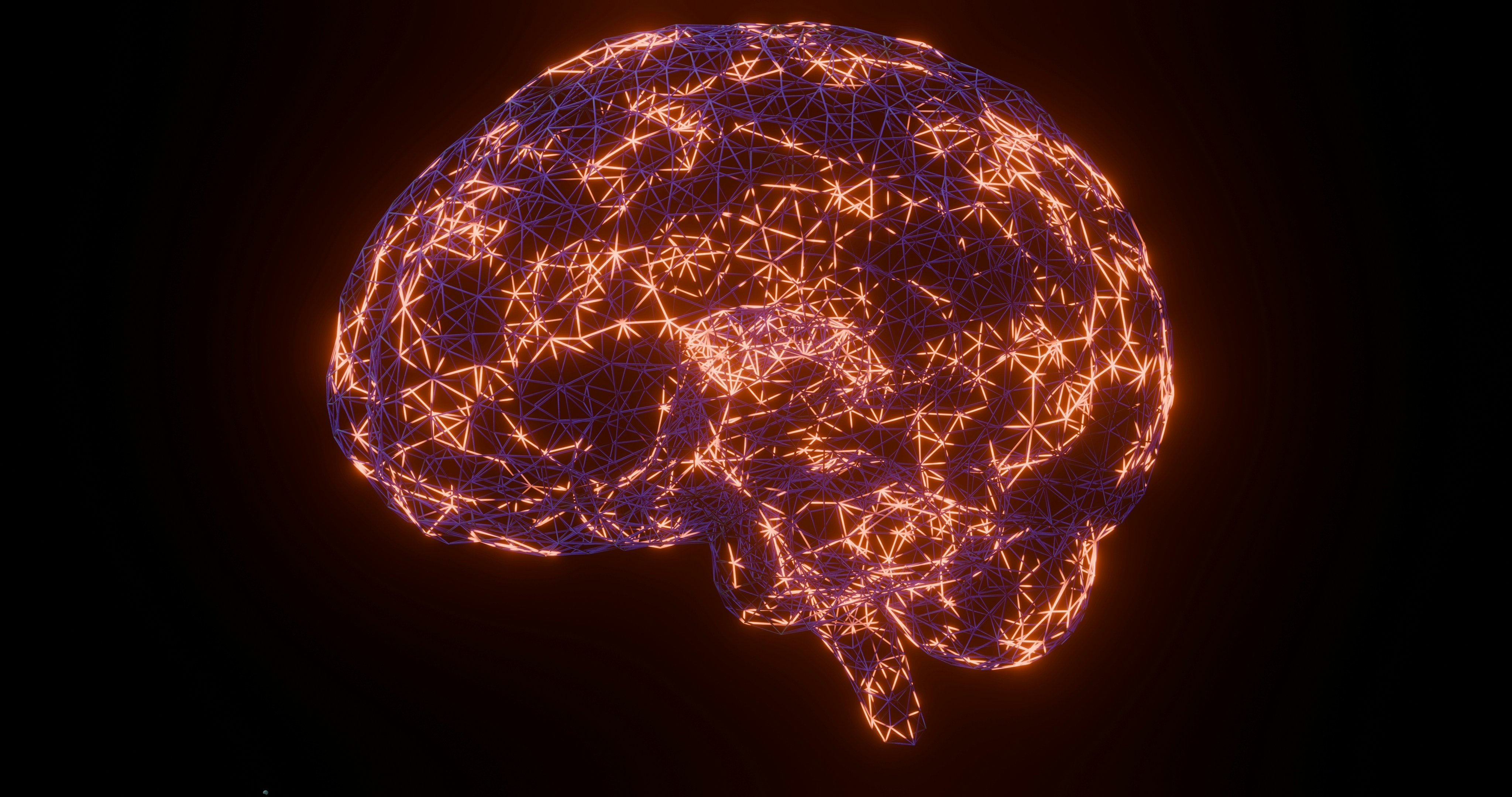 A glowing wireframe human brain with orange and purple interconnected nodes