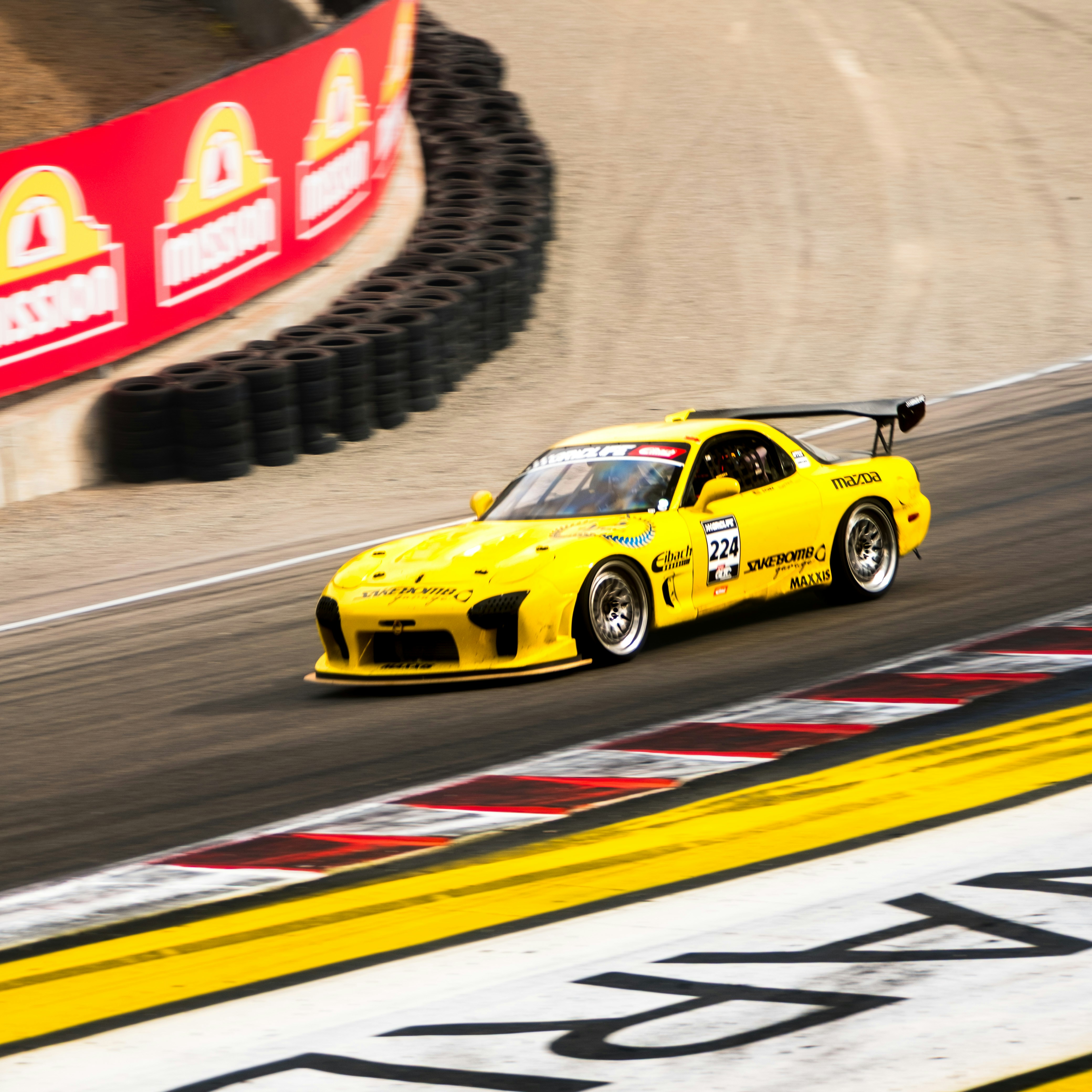 Yellow sports car racing on track - Free Photo on Unsplash