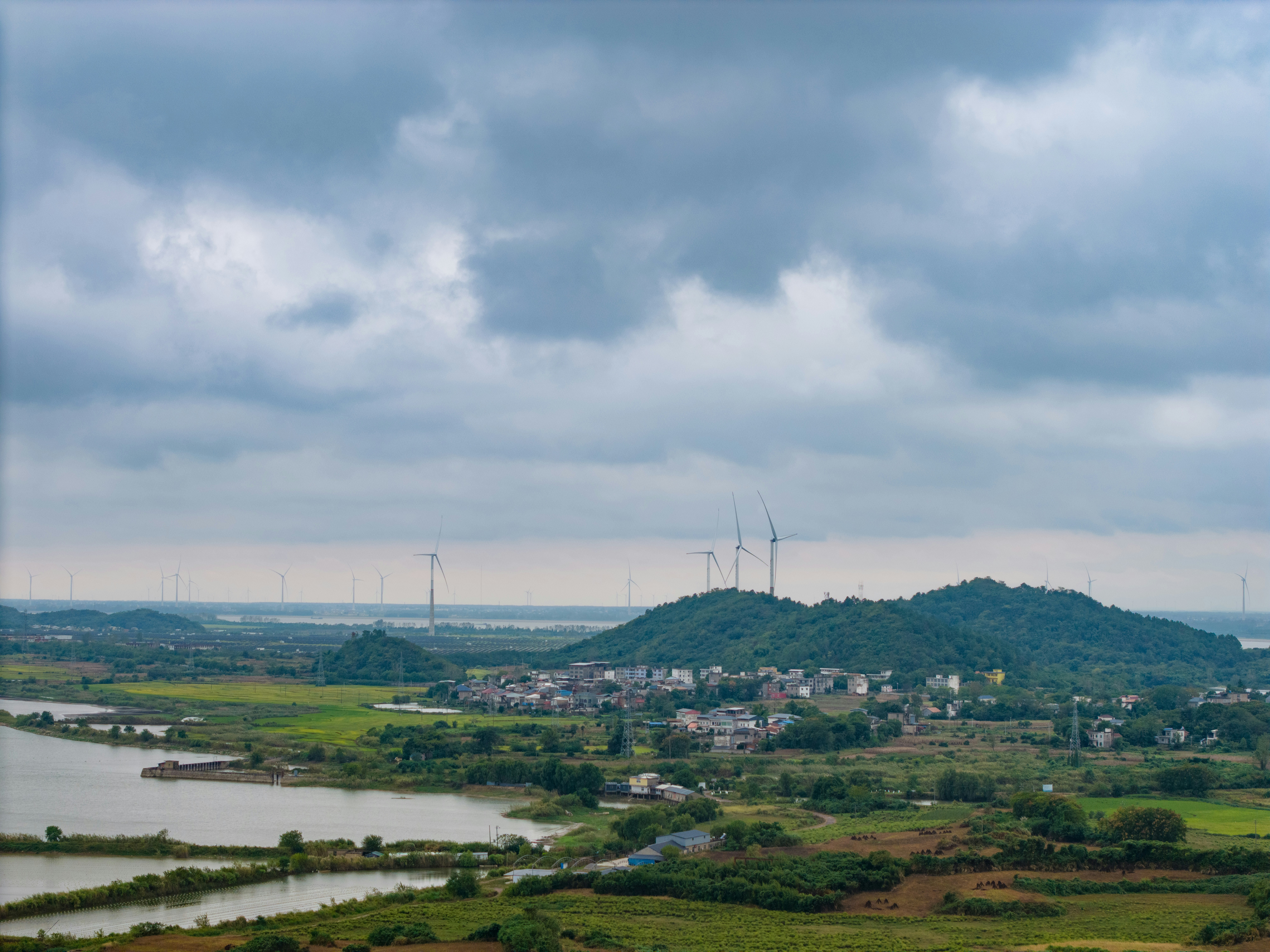 Wind turbines on green hills - Free Photo on Unsplash