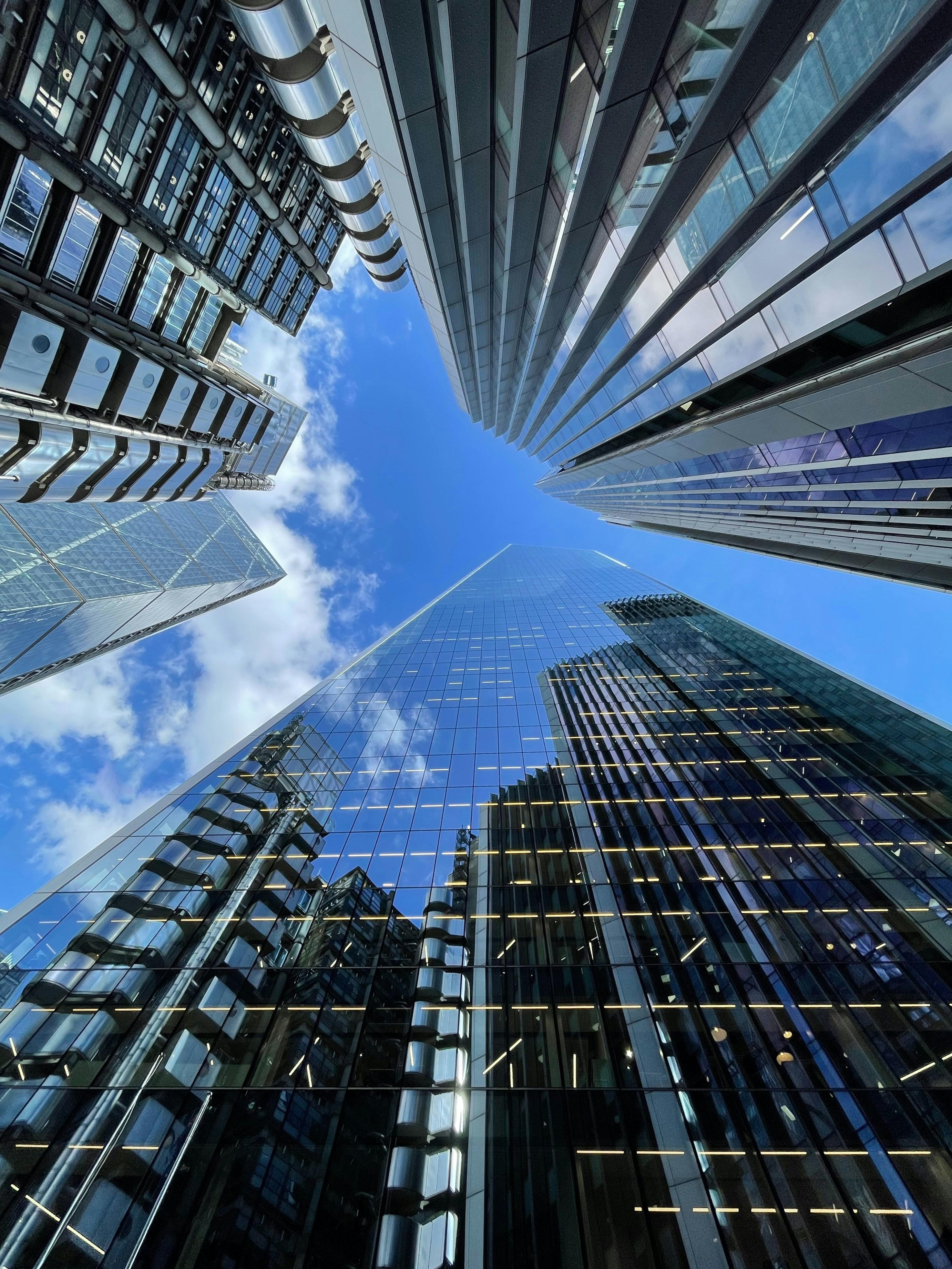 Skyscrapers reflecting blue sky - Free Photo on Unsplash