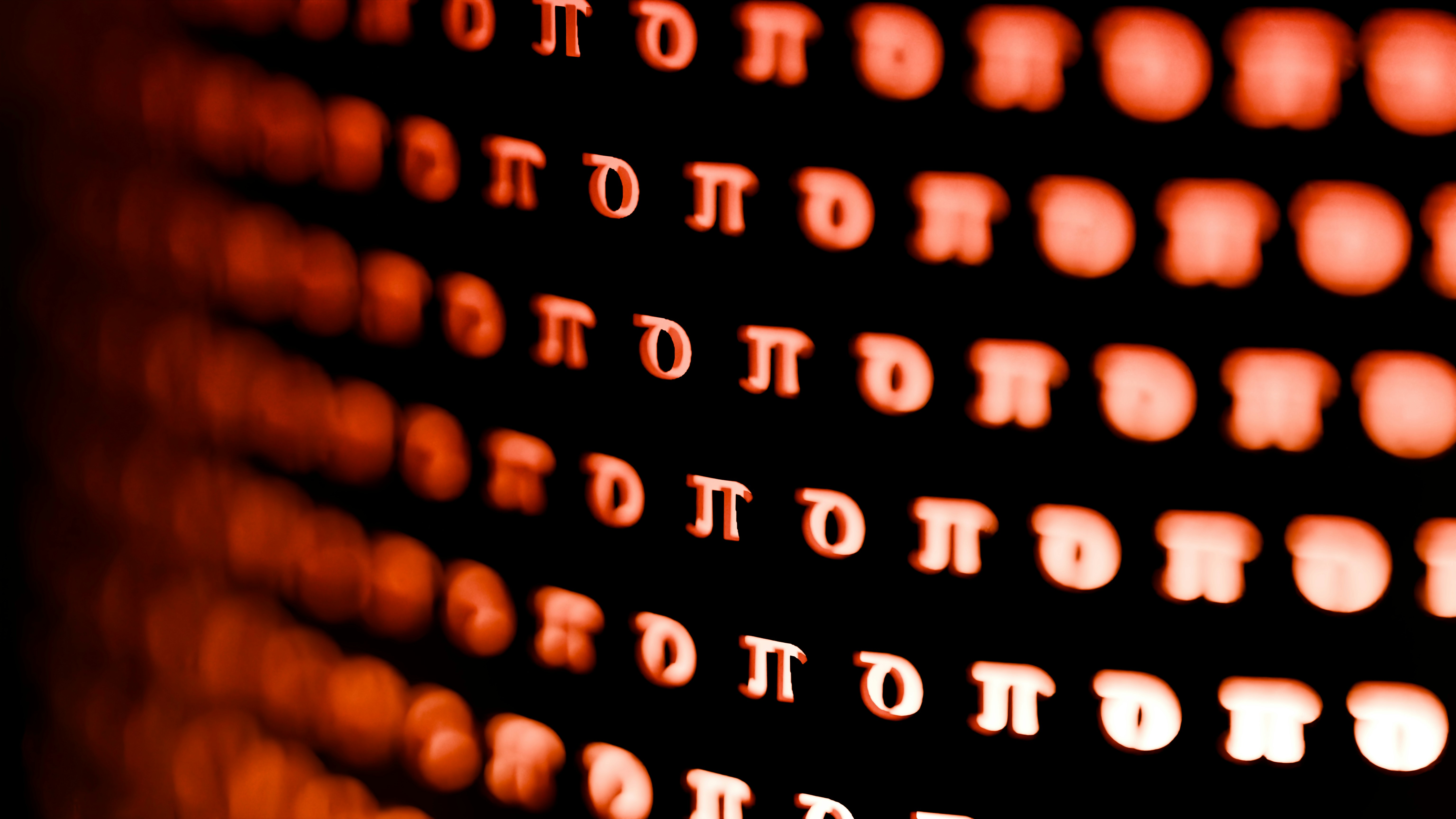 Rows of glowing orange pi symbols against a dark background