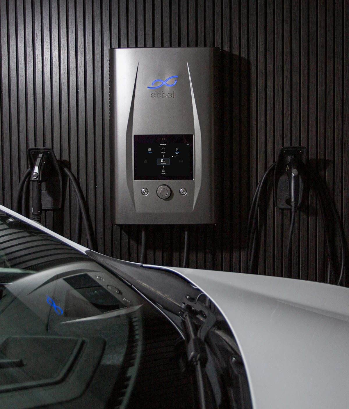 EV charger mounted on a dark slatted wall