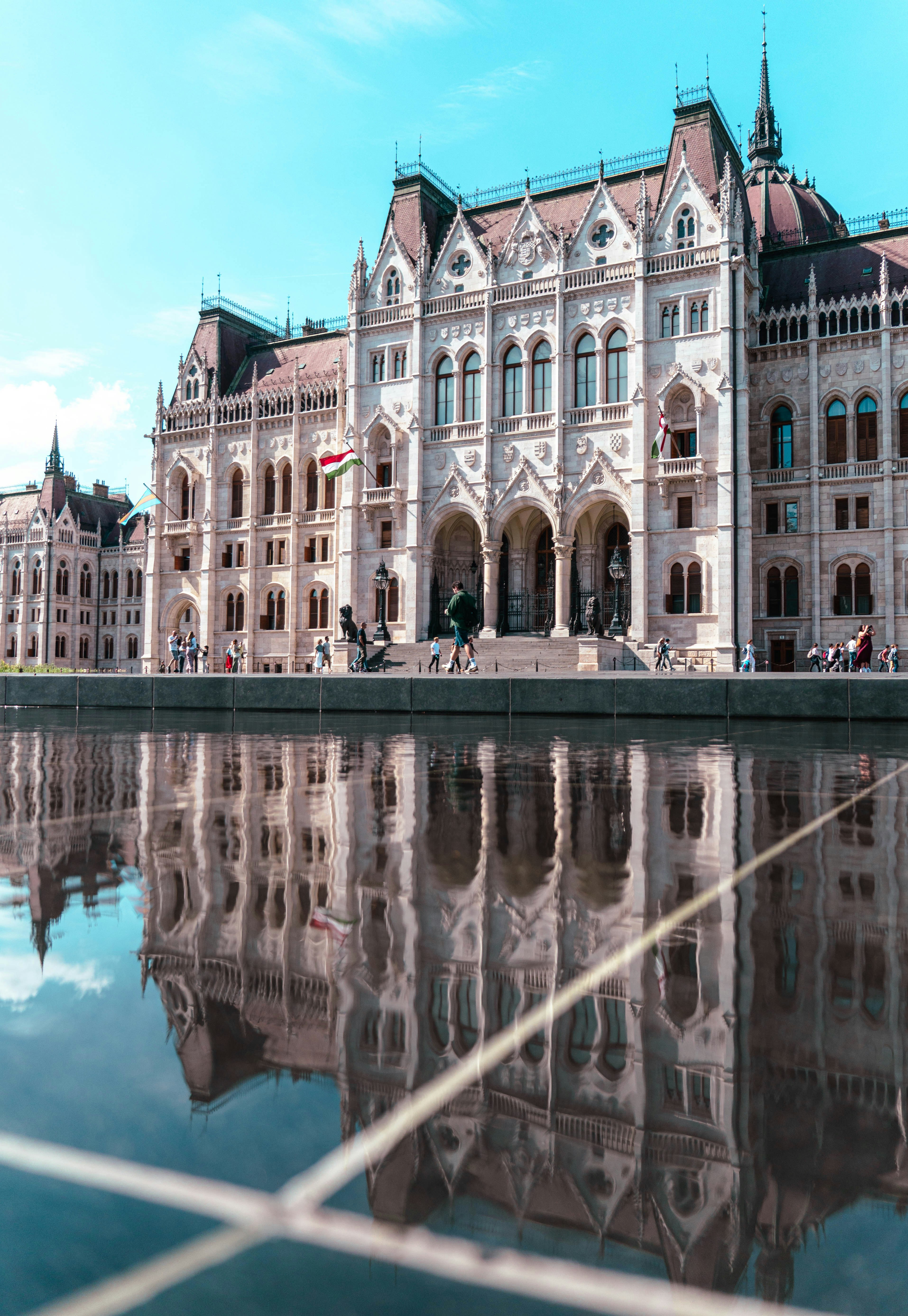 The Hungarian Parliament Building reflected in a pool of water in Budapest
