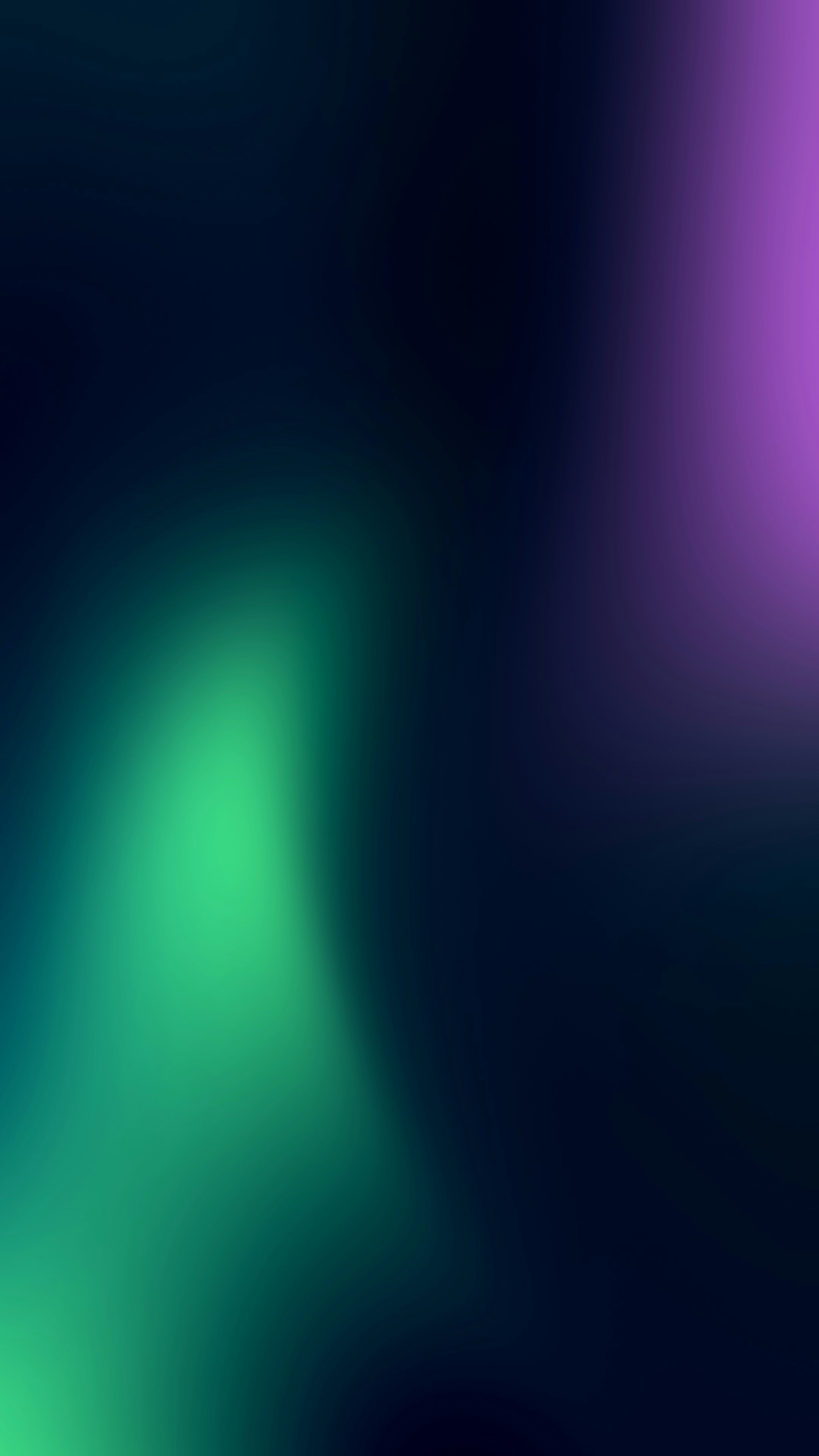 A soft gradient shifting from deep blue to vibrant green and purple