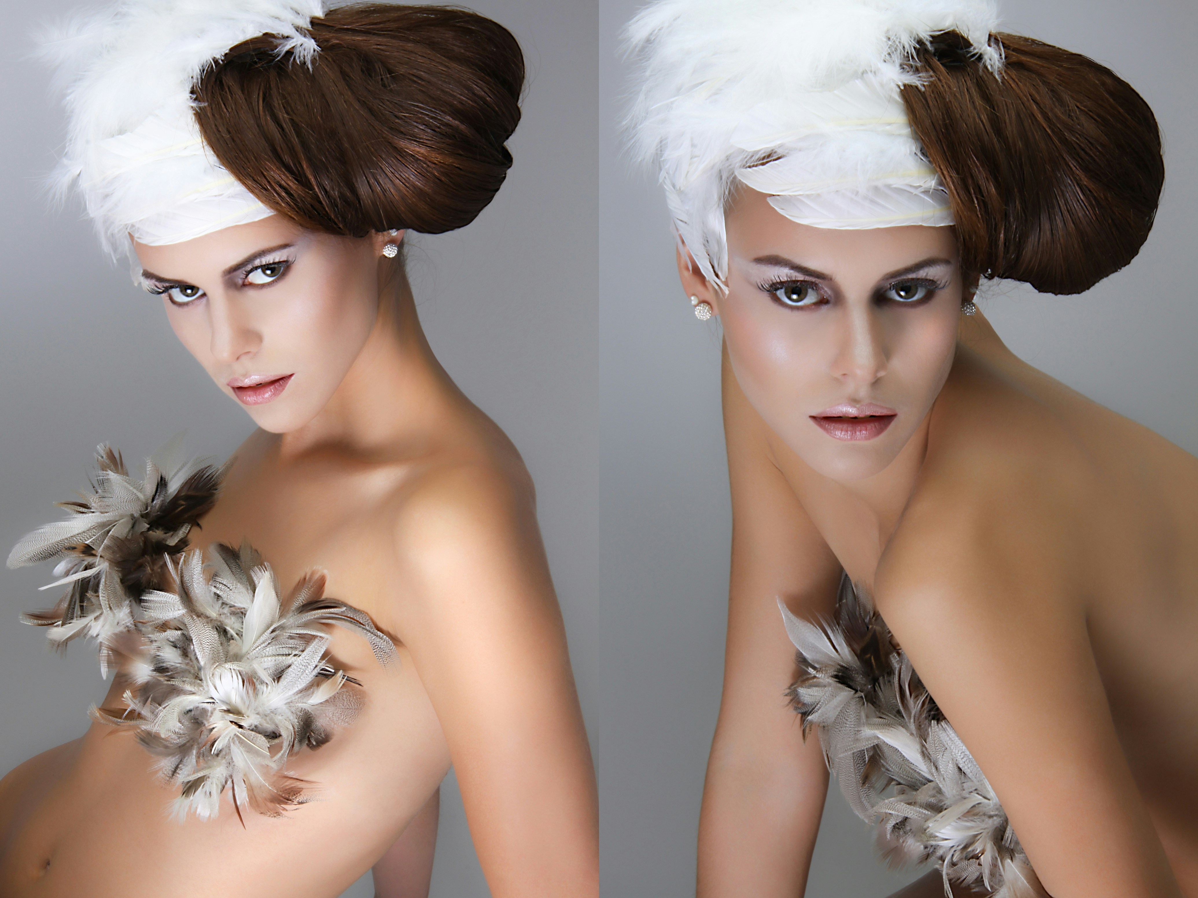 A woman with brown hair styled with white feathers and a feather bodice