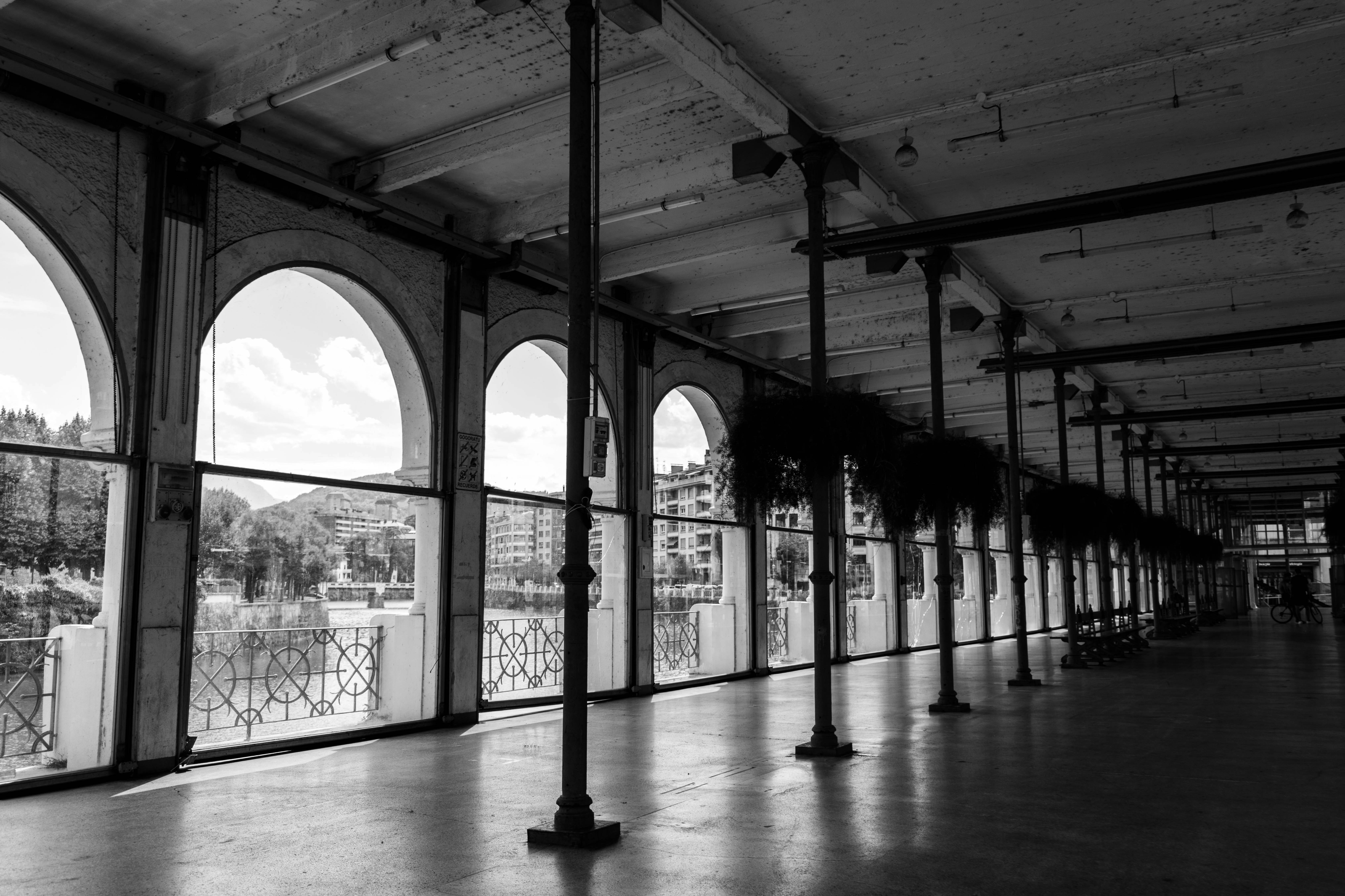 Covered walkway with arched river views - Free Photo on Unsplash
