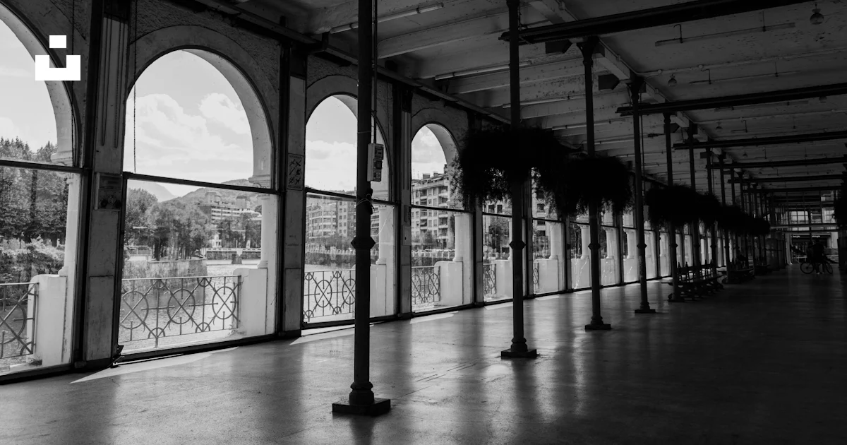 Inside Rivers Astetic Covered walkway with arched river views - Free Photo on Unsplash