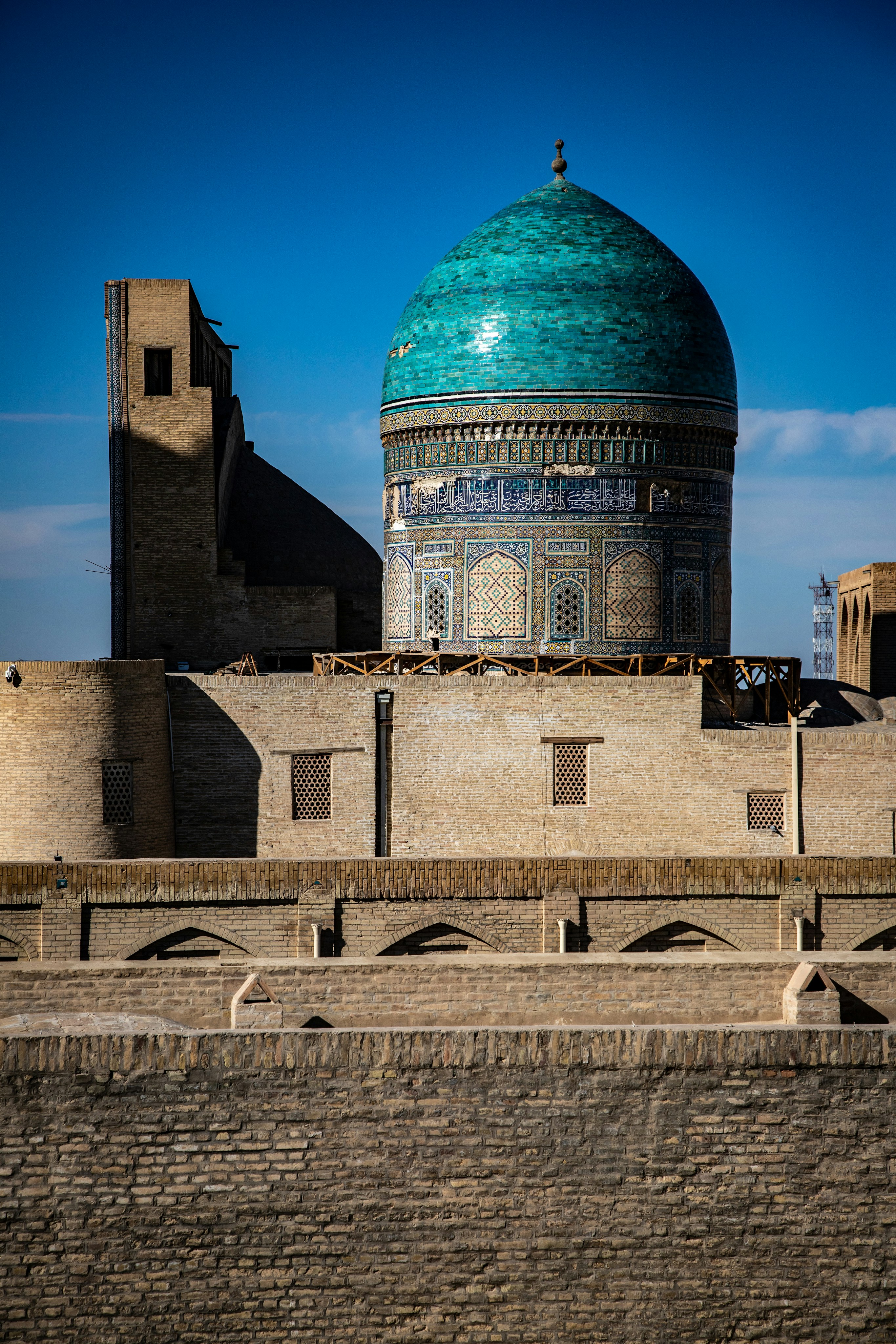 The turquoise tiled dome of the Mir-i-Arab Madrasah in Bukhara, Uzbekistan