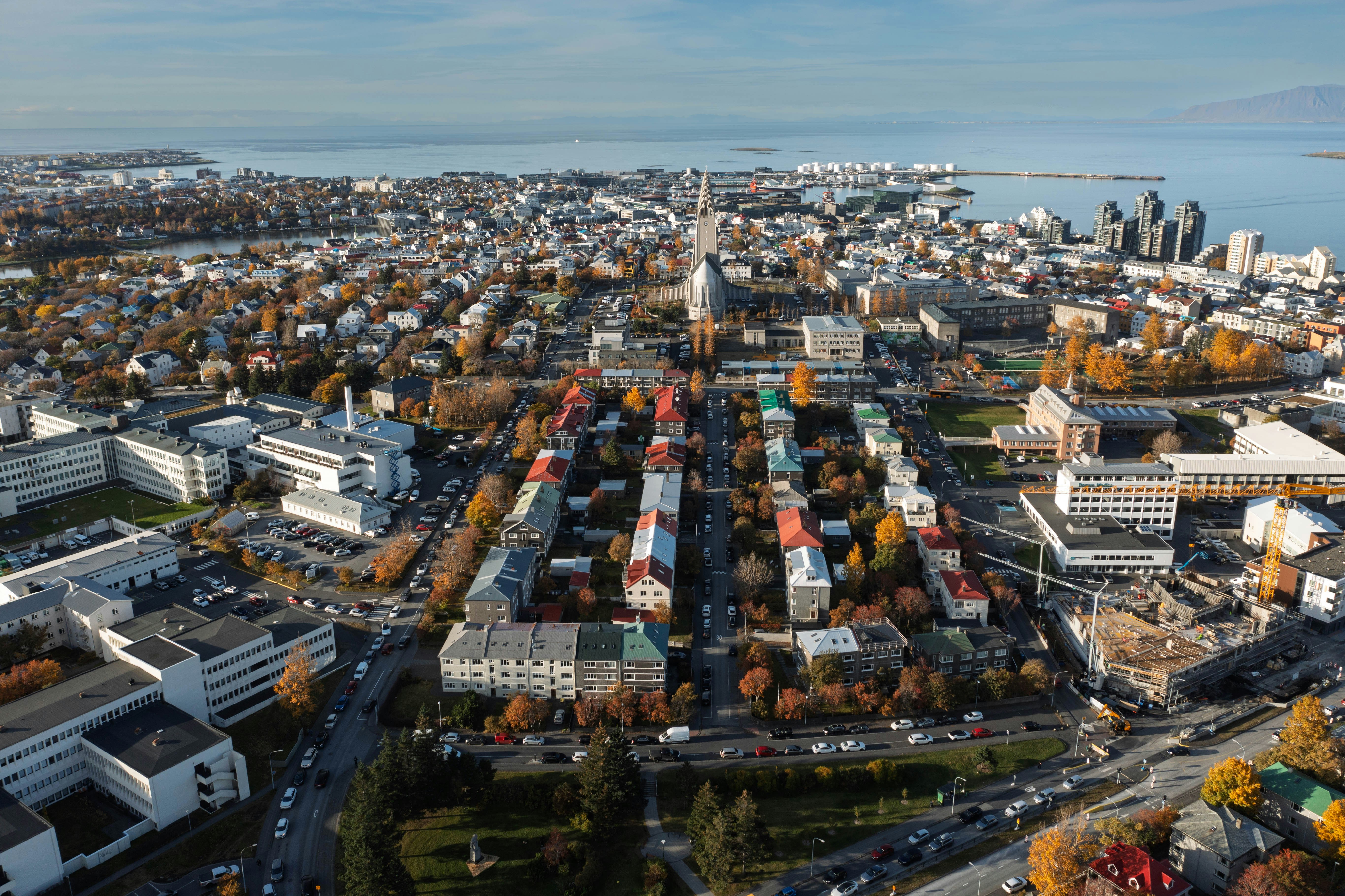 An aerial view of Hallgrímskirkja church and the surrounding cityscape of Reykjavík in Iceland