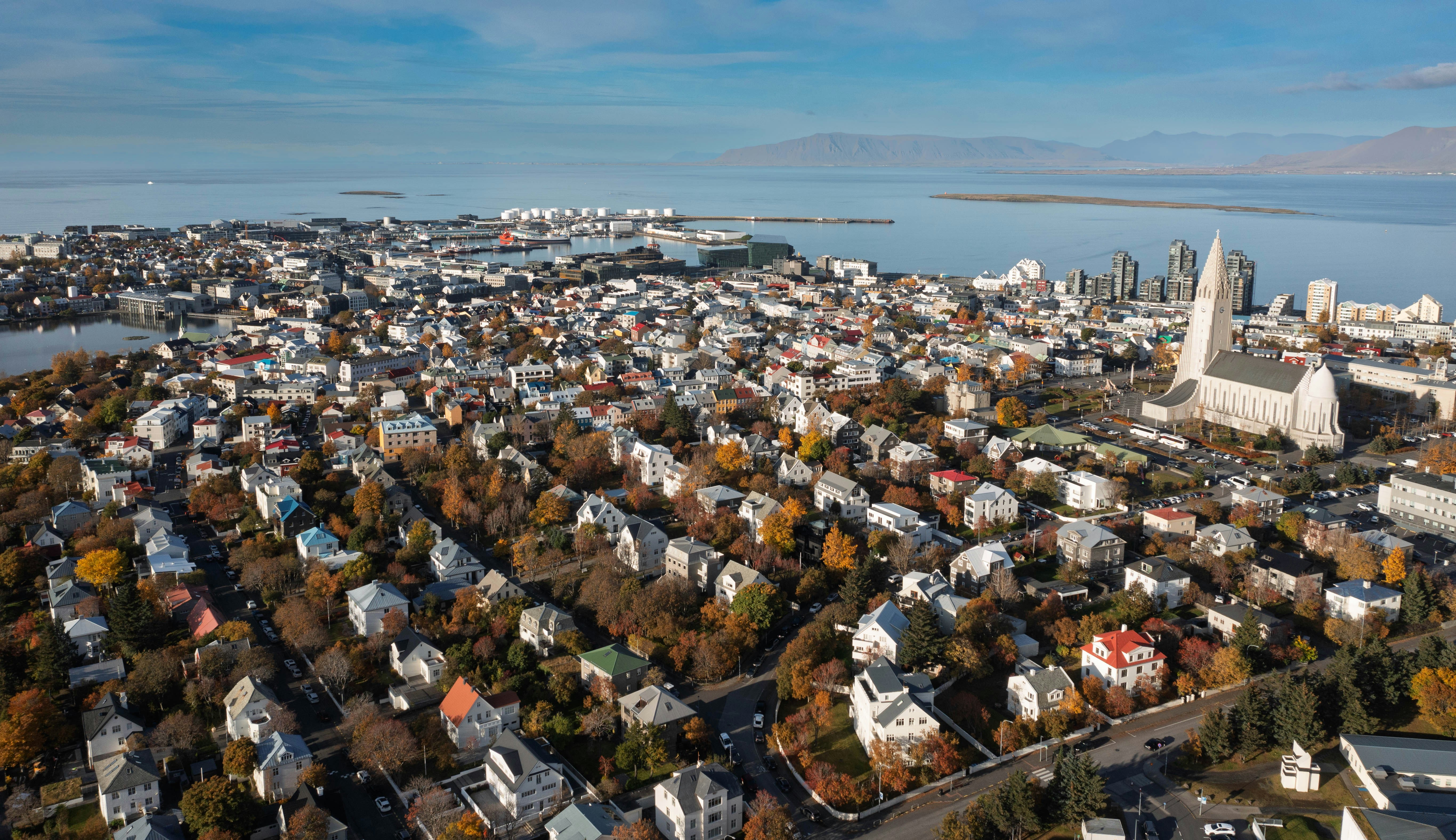 An aerial view of Hallgrímskirkja church and the surrounding cityscape of Reykjavík in Iceland
